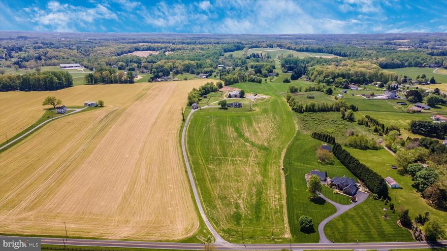 Subdividable
Welcome to 16391 A.E. Mullinix Road in Western Howard County. This 23-acre farm
offers a unique opportunity for homesteaders, farmers, developers, and land
preservation enthusiasts alike. Located in one of the most highly sought-after areas of
the county and the state, this expansive property boasts a gently rolling landscape of
lush meadows, and open pastures.
For the individual buyer, this property is one that finally offers the flexibility for you to
create a multigenerational compound for those closest to you! This parcel can be
subdivided into 4 large Estate Lots easily through the minor subdivision or the possibility of up to 11 Estate Lots through the major subdivision process. Included is an existing, spacious, 100 x 100 beautiful barn with stalls for animals as well as an indoor riding ring.
Furthermore, the land's agricultural value is also a significant selling point, as it provides
an excellent opportunity for farmers to grow crops, raise livestock, or engage in other
agricultural activities. The soil types and gentle slopes are ideal for farming, making it a
perfect place to start or expand an agricultural business and participate in Howard
County's agricultural preservation program. This program offers financial incentives to
landowners who agree to preserve their land for agricultural use, ensuring that it
remains a valuable resource for generations to come.
For a developer looking to create an enclave of exclusive homes in a prime location,
16391 A.E. Mullinix is also a rare and extraordinary opportunity. It is one of just a very
few remaining properties in the area with Growth Tier 3 classification. It also boasts
current “open” status for new residential development in all three public school levels
(elementary, middle and high), immensely expediting the subdivision process. This property is surely a desirable address for anyone looking to plant their roots in Western Howard County.