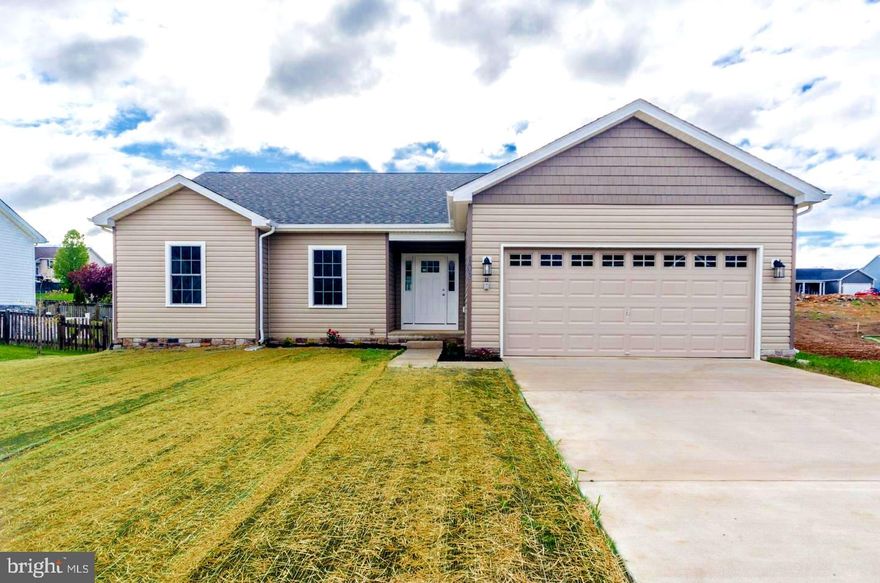 REDUCED $5,000.00 AND OFFERING A $2,500.00 CLOSING COSTS CREDIT WITH PREFERRED LENDER. CONSTRUCTION IS COMPLETE AND THE HOME IS MOVE IN READY. THIS RANCHER OFFERS A SPLIT BEDROOM DESIGN WITH A GREAT ROOM FEATURING CATHEDRAL CEILING SEPARATING THE MASTER SUITE FROM BEDROOMS #2 AND 3. THE EAT IN KITCHEN OFFERS UPGRADED CABINETRY, GRANITE COUNTERS, STAINLESS STEEL APPLIANCES, GARBAGE DISPOSAL AND AN ISLAND WITH OVERHANG FOR STOOLS. THE SPACIOUS MASTER SUITE FEATURES A LARGE WALK IN CLOSET, TRAY CEILING & CEILING FAN AS WELL AS A MASTER BATH WITH OVERSIZED SHOWER, DOUBLE SINK VANITY AND LINEN CLOSET. THE FINISHED TWO CAR GARAGE HAS AN INSULATED GARAGE DOOR AND AUTOMATIC GARAGE DOOR OPENER. CONSTRUCTED ON A HUGE, FULL UNFINISHED BASEMENT OFFERING PLENTY OF ROOM FOR EXPANSION & STORAGE AND ROUGHED IN PLUMBING FOR A FUTURE BATHROOM. INCLUDES  A LARGE 12'X16' DECK.ALL OF THIS LOCATED IN AN UPSCALE DEVELOPMENT WITH SIDEWALKS, CURB & GUTTER, CONCRETE DRIVEWAYS AND INDIVIDUAL SIDEWALKS. CALL TODAY TO ARRANGE TO VIEW THIS HOME. ADDITIONAL BUILDING LOTS AND FLOOR PLANS TO CHOOSE FROM...