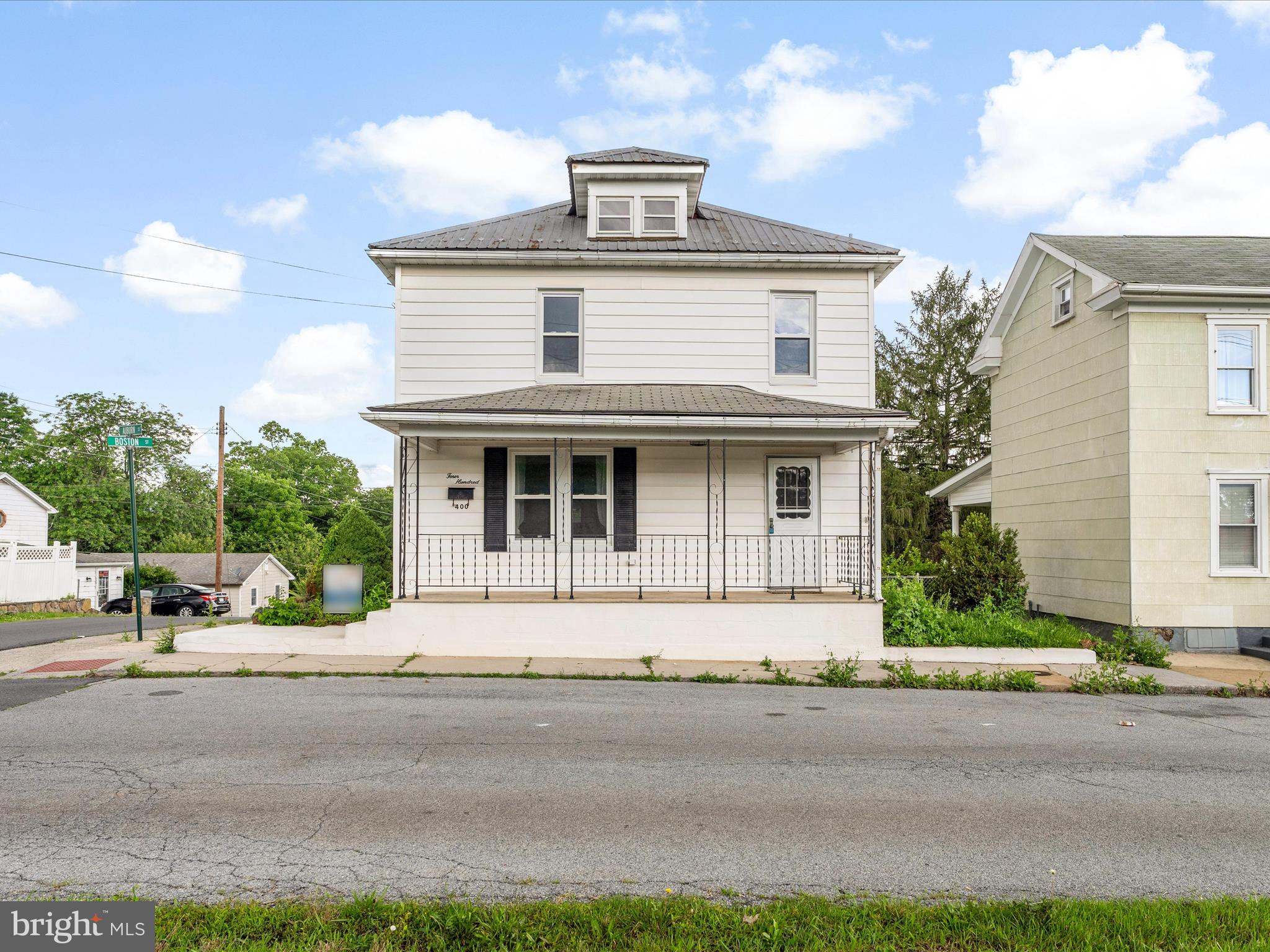 Welcome home to 400 Auburn Street! This well-designed home offers a flexible layout to suit many needs. The main level features a spacious living room, a separate dining nook, laundry room with exterior access, and a flex room with an attached full bath that’s handicap accessible- it could easily be turned into a main floor bedroom if needed. Upstairs, you’ll find three generously sized bedrooms with brand-new carpet and full bathroom. Recent updates include new LVP flooring, a new boiler heating system, stainless steel kitchen appliances, tile backsplash, and freshly painted cabinets—saving future homeowners time and money. Conveniently located minutes from Berkeley Medical Center, I-81, and tucked away on a quiet one-way street. This home is perfect for the budget savvy buyer, investor, or first time home buyers. Schedule your showing today!