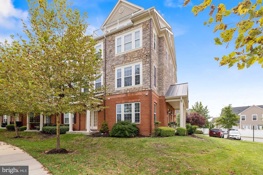 Lovely end unit 4-level Townhouse Condo in a very convenient Ashburn location. Main level features Modern Electric Fireplace with Brick Accent Wall, Custom Wine Rack, 2 Entrances with 2 small patios and tons of natural light.  Kitchen includes Stainless Steel Appliances, Rich Dark Cabinetry and Granite Countertop. An Entire 2nd floor Master Suite with Sitting Room, Walk-in Closet and spacious Master Bath. The 4th Level features an open Den/Office with a Wet Bar and walk out Rooftop Terrace with an amazing view overlooking the Blueridge mountains. Nest Doorbell, Nest Thermostat and Nest Camera are included the lease. Few minutes drive to shopping, Dulles Airport and the new Broadland Metro Station.