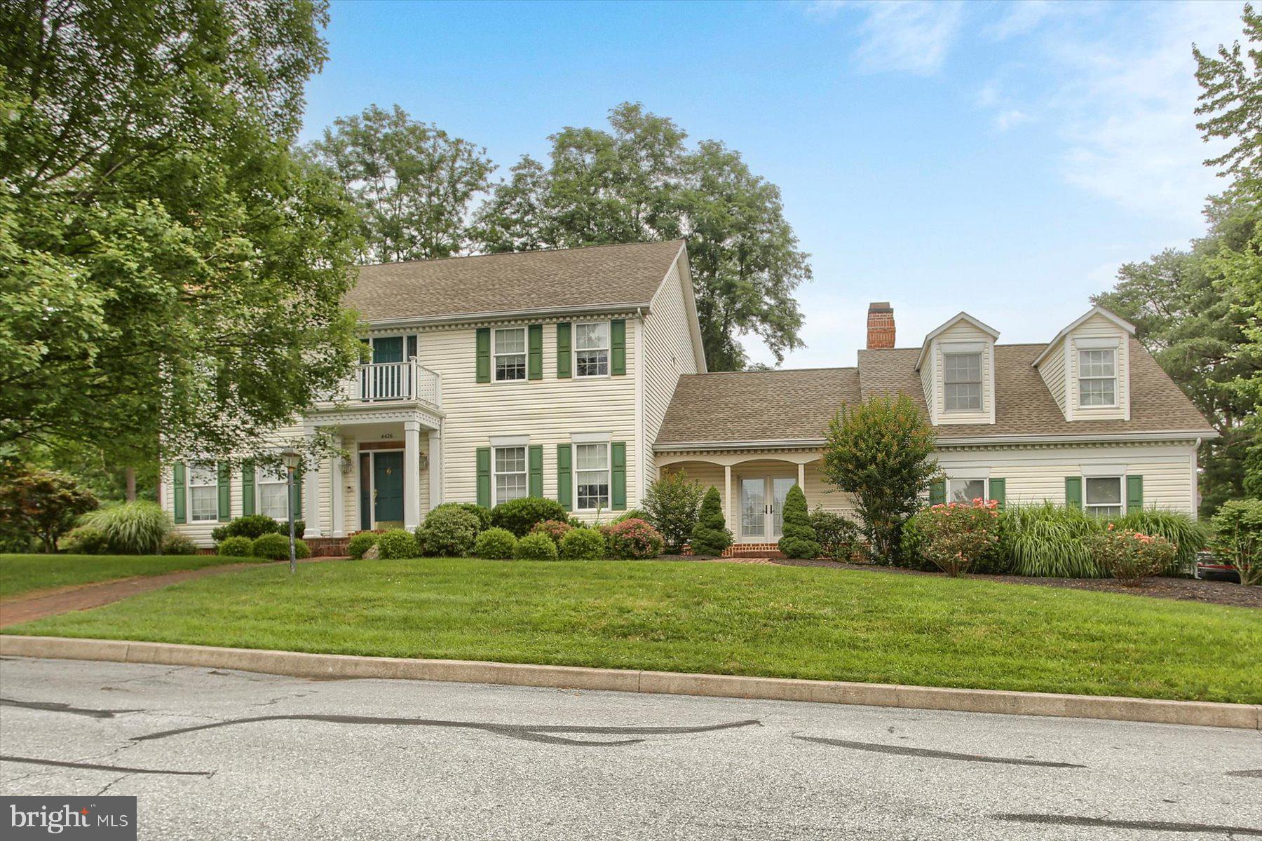 Spacious 3,649 sq. ft. home with a versatile bonus room above the garage. The custom cook’s kitchen features a large island, service bar, and a breakfast area that opens to the family room with a vaulted ceiling and wood-burning fireplace. Formal living room with gas fireplace and formal dining room offer great entertaining space. Main level also includes a den/office, laundry room, mudroom, and a large foyer. The primary suite boasts a gas fireplace, sitting area, and a luxurious bath with whirlpool tub and separate shower. Enjoy outdoor living on the screened porch with cathedral ceiling and skylight. Three garage bay doors accommodate two cars plus a separate storage bay for outdoor equipment and toys. You’ll love this home and the neighborhood!