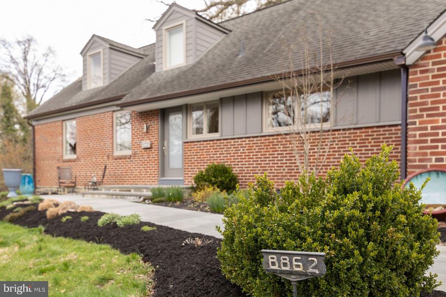 Beautifully updated Cape Cod at 8862 Norwood is now available for showings.
Nestled on a quiet cul-de-sac, this charming home is surrounded by mature trees and thoughtfully landscaped yards, offering both privacy and tranquility—yet just a short walk to the "top of the hill" for shops, restaurants, and regional rail lines for easy access to Center City.

Arrive home via a private driveway with parking for multiple vehicles and a spacious attached garage, perfect for keeping your car protected year-round with additional storage space. Flagstone walkways guide you through the beautifully landscaped front yard and into a serene backyard oasis—ideal for gardening, grilling, or entertaining.

Inside, bright, sun-filled rooms and an open-concept layout create a warm and inviting atmosphere. Hardwood floors run throughout the main level, where the living space flows seamlessly into a stunning, updated kitchen featuring a large center island, dining area, and a cozy gas fireplace. French doors and oversized windows provide picturesque views of the backyard and fill the space with natural light.

The main floor offers two versatile bedrooms with generous closet space—perfect for guests, home offices, or flex rooms—along with a stylish half bath.

Upstairs, retreat to the custom-designed primary suite, complete with a luxurious full bath featuring radiant heated floors, custom tile work, and a walnut vanity.

Blending classic 1920s Chestnut Hill craftsmanship with high-end modern upgrades, this home showcases exceptional attention to detail throughout. Notable features include:

Custom kitchen by Conestoga Kitchen with quartz countertops and matching backsplash,
Premium Miele appliances and Sub-Zero refrigerator,
Built-in steamer oven and custom cabinetry,
Gas fireplace and oak hardwood flooring,
Elegant Galbraith & Paul wallpaper and custom walnut vanity in powder room,
Artisan-crafted hand railings by Bradford Woodworking,
Central air and mini-split systems.

A large unfinished basement offers endless potential—perfect for a future entertainment space, workshop, or additional living area.

Don’t miss this unique opportunity—schedule your private showing or visit one of the open houses this weekend!  Open house Saturday 1-3pm, Sunday 12-2pm.