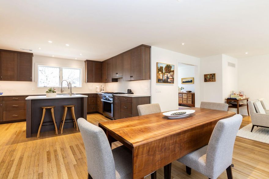 Beautifully updated Cape Cod at 8862 Norwood in Chestnut Hill.
Nestled on a quiet cul-de-sac, this charming home is surrounded by mature trees and thoughtfully landscaped yards, offering both privacy and tranquility—yet just a short walk to the "top of the hill" for shops, restaurants, and regional rail lines for easy access to Center City.

Arrive home via a private driveway with parking for multiple vehicles and a spacious attached garage, perfect for keeping your car protected year-round with additional storage space. Flagstone walkways guide you through the beautifully landscaped front yard and into a serene backyard oasis—ideal for gardening, grilling, or entertaining.

Inside, bright, sun-filled rooms and an open-concept layout create a warm and inviting atmosphere. Hardwood floors run throughout the main level, where the living space flows seamlessly into a stunning, updated kitchen featuring a large center island, dining area, and a cozy gas fireplace. French doors and oversized windows provide picturesque views of the backyard and fill the space with natural light.

The main floor offers two versatile bedrooms with generous closet space—perfect for guests, home offices, or flex rooms—along with a stylish half bath.

Upstairs, retreat to the custom-designed primary suite, complete with a luxurious full bath featuring radiant heated floors, custom tile work, and a walnut vanity.

Blending classic 1920s Chestnut Hill craftsmanship with high-end modern upgrades, this home showcases exceptional attention to detail throughout. Notable features include:

Custom kitchen by Conestoga Kitchen with quartz countertops and matching backsplash,
Premium Miele appliances and Sub-Zero refrigerator,
Built-in steamer oven and custom cabinetry,
Gas fireplace and oak hardwood flooring,
Elegant Galbraith & Paul wallpaper and custom walnut vanity in powder room,
Artisan-crafted hand railings by Bradford Woodworking,
Central air and mini-split systems.

A large unfinished basement offers endless potential—perfect for a future entertainment space, workshop, or additional living area.

Don’t miss this unique opportunity—call today to schedule a private showing.