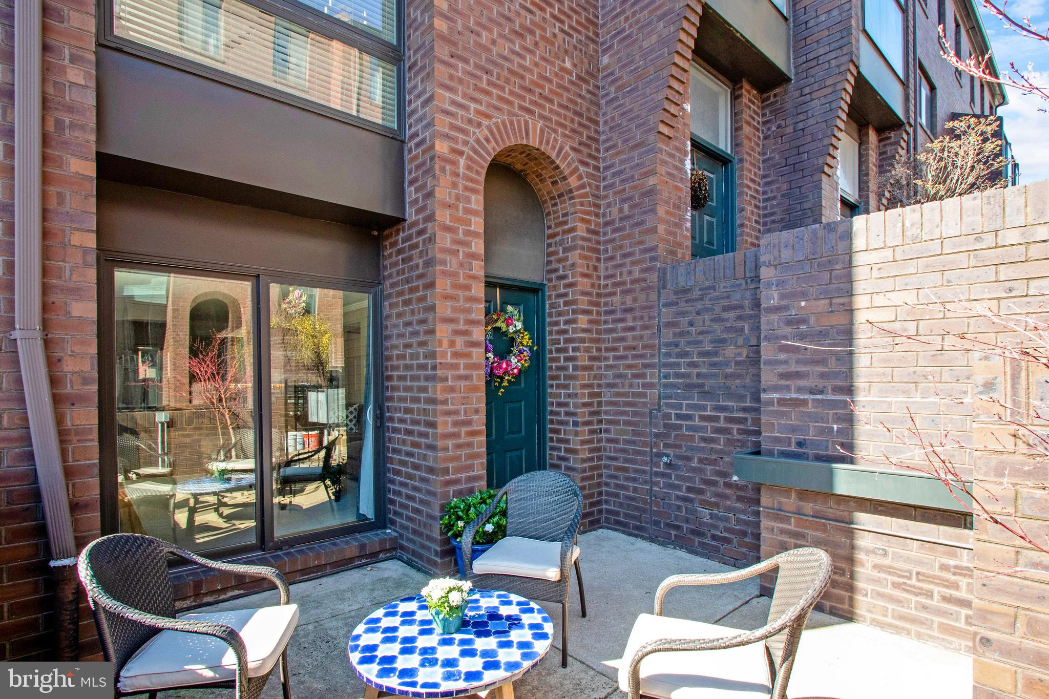 Spacious, 3 bed, 2 and a half bath, corner townhome with GARAGE PARKING in coveted Logan Square. Expansive first floor with hardwood floors, wood burning fireplace, recessed lighting, and a modern kitchen with stainless steel appliances. Two private outdoor areas are perfect for entertaining and relaxing. The second floor features three bedrooms with ample closet space. The over-sized master suite also has its own en-suite bath, and the tiled hall bath features a shower stall. New Pella Windows installed throughout, combined with the premium corner lot location, allow for amazing natural light rarely found in a Philadelphia row home. The gated entryway allows for secure package delivery. Steps from Trader Joe's, Comcast Center, and the Schuylkill River Trail, this home is a short walk to Center City and convenient to all of downtown Philadelphia. Urban living at its finest!