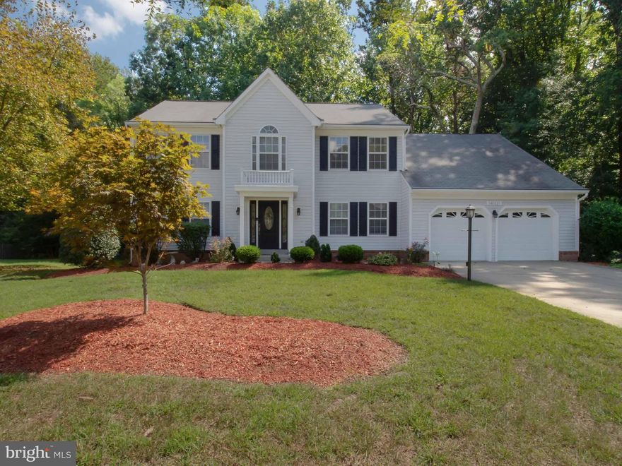 Luxurious 5 bedroom colonial on cul de sac. Home offers a wood-burning fireplace & possible in-law suite. The walkout bsmnt includes 5th BR, full bath, wet bar, 2nd fam rm, & exercise room.  The main level includes office/study, formal dining rm, Liv Rm, spacious family room, and kitchen with island and breakfast area w/ slider opening to large deck with stairs leading to a nature lovers paradise.