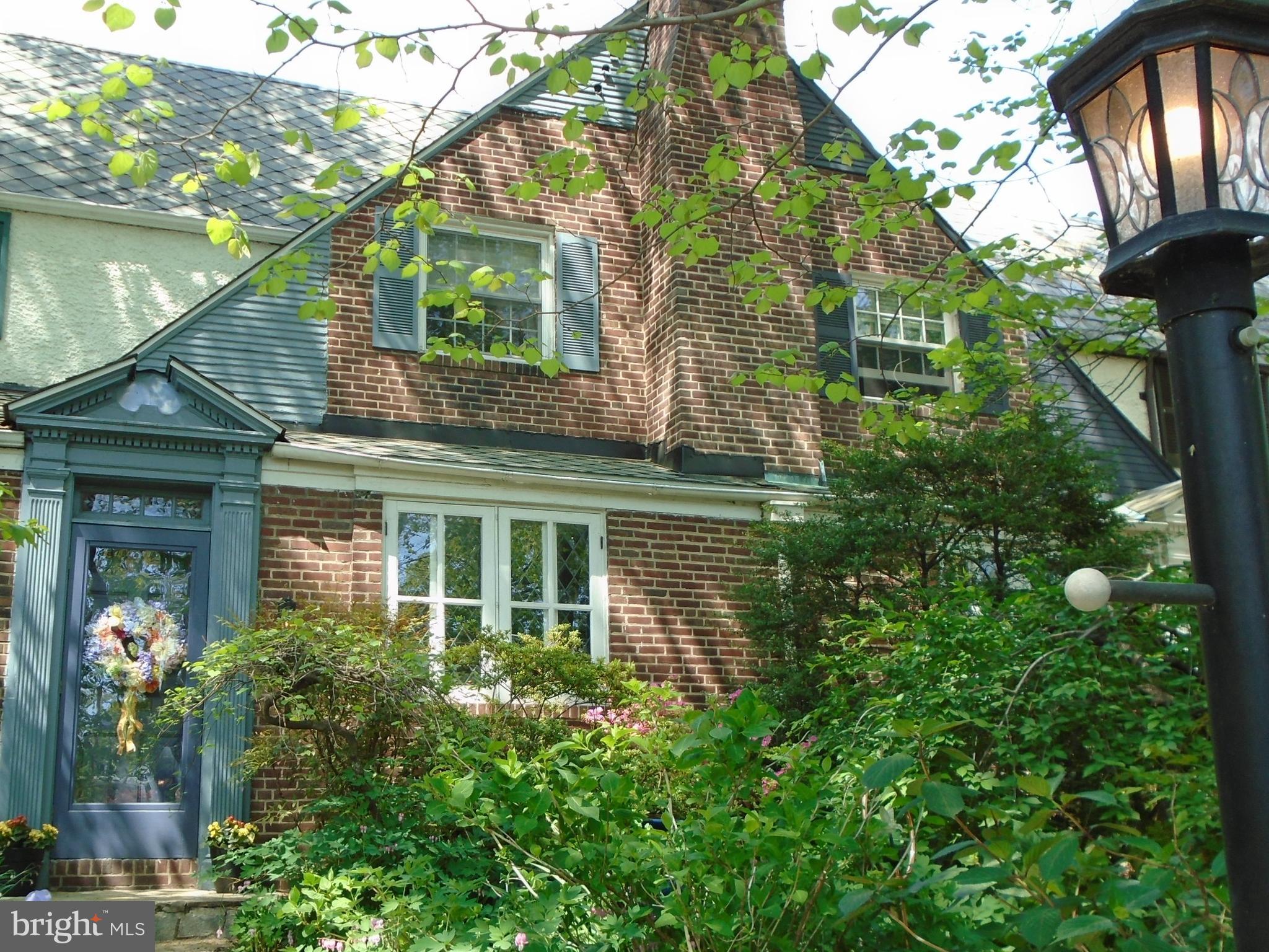 Tudor Townhome with three finished levels, wood floors, full size living room & separate dining room. 2nd level balcony overlooking rear patio & garden. Original architectural features and moldings throughout. Beautifully renovated 2nd fl bath with walk in shower, beautiful ceramic tile work. One car garage across back alley. Short walk to Belvedere Square,The Senator, grocery stores and shopping.
