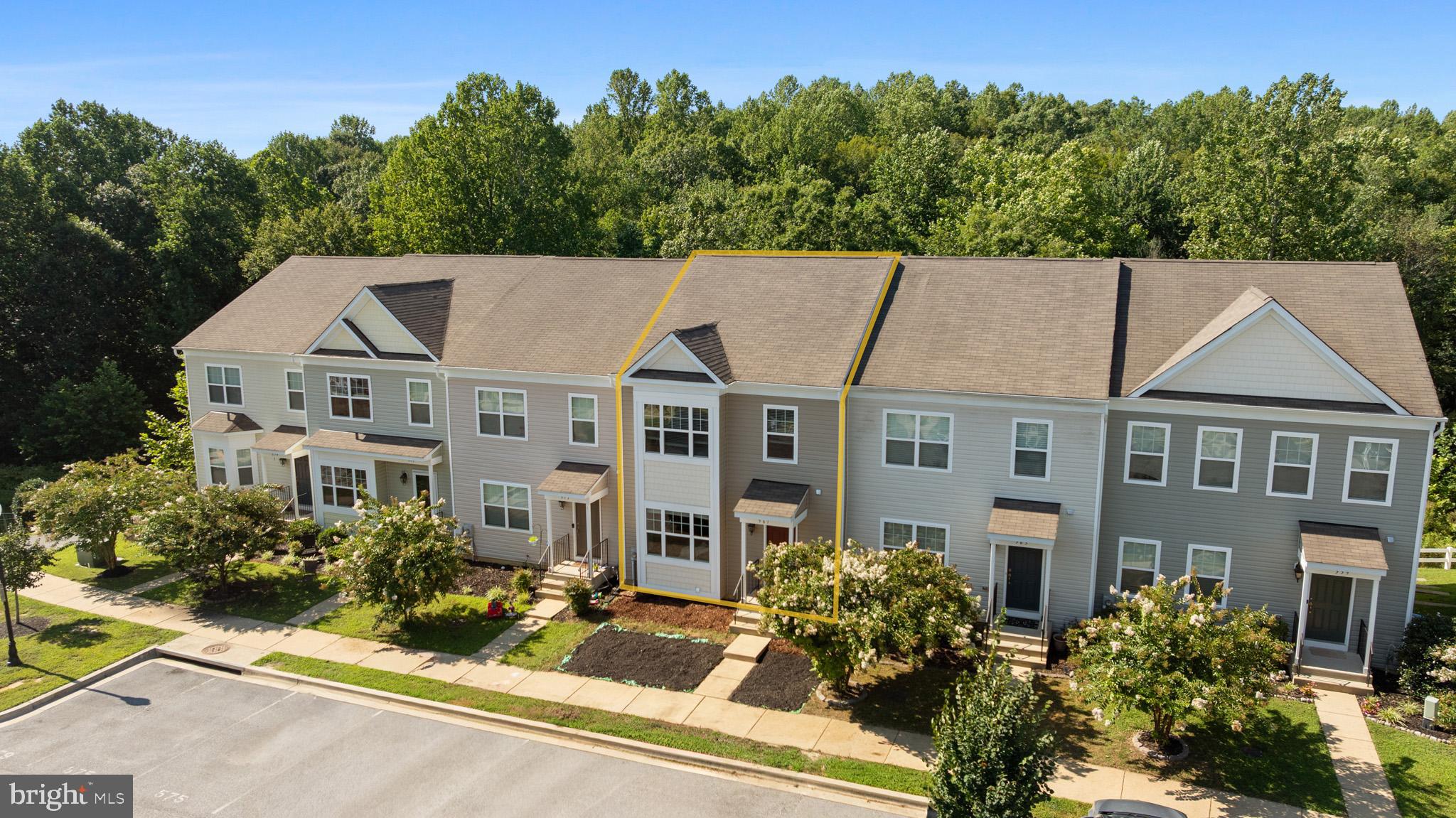 Welcome home to this immaculately maintained 3-bedroom, 3.5-bath, 3-level townhouse in the sought after Oak Tree Landing community in Prince Frederick! Step inside the front door to an open floorplan with 9 ft ceilings and luxury vinyl plank flooring. The spacious family room has a ceiling fan, tons of natural lighting and flows seamlessly into the kitchen. Kitchen boasts 42’ cabinets, an island with additional cabinetry, black appliances, granite countertops, a pantry and a dining nook! Sliding glass doors off the dining nook leads to the cozy deck with privacy on both sides and views backing to trees. Upstairs, you'll find a roomy primary bedroom with vaulted ceilings, an attached bathroom with double sinks and a large walk-in shower with dual shower heads. Upstairs also has two additional nicely sized bedrooms and a full hallway bathroom. The finished basement (with brand new carpet throughout!) includes an open rec room, a full bathroom, a sliding glass door walk-out level to the backyard, and a storage room with a laundry area. Just minutes from TONS of shopping (including a brand-new shopping center opening soon!!), dining, schools, hospitals, and an easy commute to DC, Annapolis, and NOVA. Don't miss this incredible opportunity—schedule your showing today!