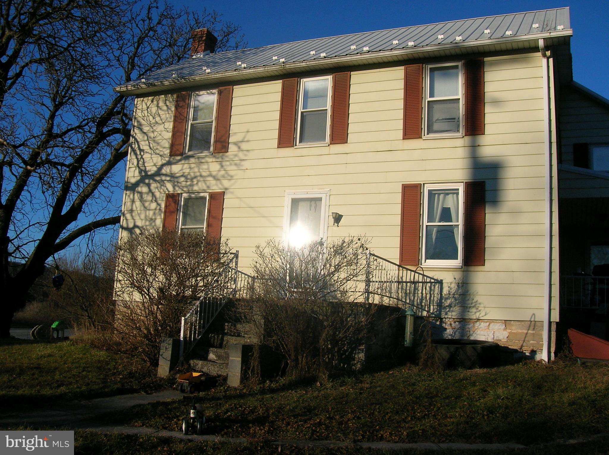 Traditional 2.5 story home with 3 brs. & 2 baths.  1st floor primary bedroom with bath.
Large 3  Morton Pole bldg. for all your toys & hobbies.  Needs some updating.  New metal roof.
NO SIGN ON PROPERTY PRESENTLY