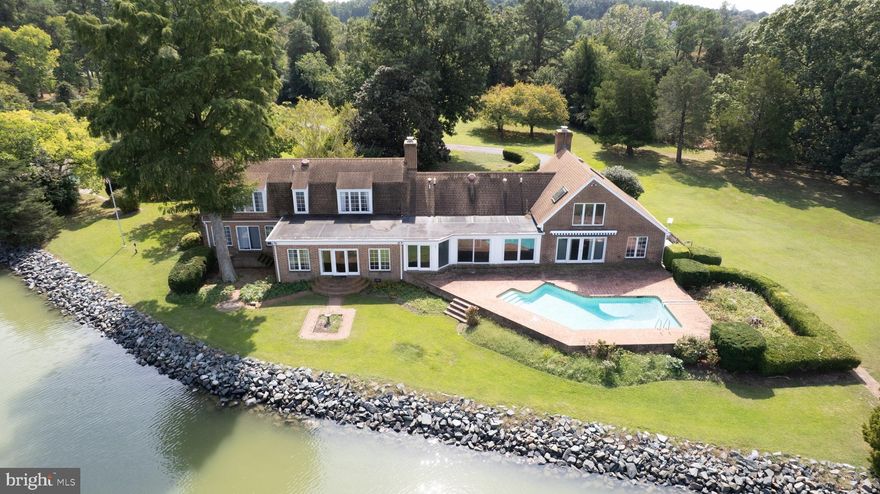 Royal Oak - escape to your own Eastern Shore estate.  Anderby Hall is part of an original 1680 land grant.  This 12 +/- acre parcel features 3,260' +/- of shoreline (mostly rip rapped) including a tidal pond and island (accessed by bridge)to  a private peninsula and private cove.  The gated driveway leads to the main house- a 3000 +/- sq.ft. Colonial featuring a great room with fireplace, charming old pine floors and hand hewn ceiling beams.  Granite kitchen with island.  Primary suite with his/her closets and second floor office/den area.  Almost every room offers a gorgeous view of Irish Creek. Brick walkways ways lead to the water side pool.  The dock has 5'MLW and you are minutes to the Choptank RIver.  Additional 2600 sq. foot guest house.  Tennis courts (could be picklebal!l) with gazebo.  30x50 detached 3 car garage, and an additional 1 car garage with workshop and a service shed. Licensed shoreline. Geese, ducks, deer, turkey. Convenient to Easton and St. Michaels Enjoy a lifestyle of luxury, privacy, and natural beauty. Embrace the exclusive charm of waterfront living today!