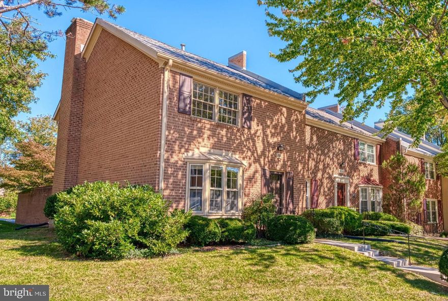 Freshly painted and with updated light fixtures throughout, you can move right in to this lovely, brick end-unit Springfield home in the fantastic Charlestown neighborhood! The curved staircase, an unusual townhome feature, provides an elegant welcome. Easily entertain guests in the sunny living room and adjacent private dining room with access to the fenced rear yard & patio. The charming kitchen has room for a bistro table set and there's a brand new stainless stove and refrigerator. The spacious lower level family room, is perfect for tailgating at home! Excellent storage, including a pantry, walk-in closets and generous basement utility room. Just outside the back gate are two reserved parking spaces. There's plenty of on-street guest parking.  Easy access to 495 / 395 / 95  or commute to GMU. Near lovely Lake Accotink Park with trails, a lake/boating, mini golf & more. Bus stop nearby goes directly to the Pentagon. What a fun neighborhood for trick or treating!! On-site management is also very convenient!