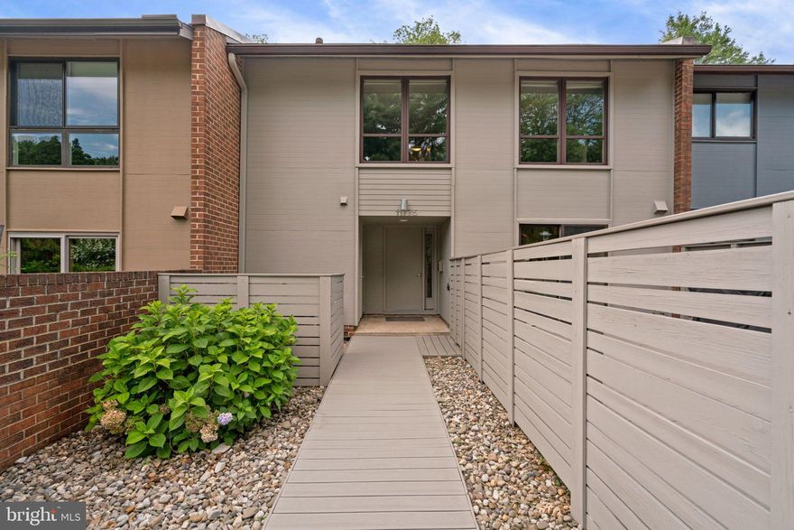 ** Offer deadline for best and final - Friday 7/28 at 2 PM**

Enjoy your morning coffee overlooking 10th fairway at Reston National Golf Course. Multi-level contemporary home on premium lot in desirable Hunters Green cluster. Largest model (Alpha) in community with 2 story living room, 4 large bedrooms, updated kitchen with granite and SS appliances, plus hardwoods throughout. Lower-level walkout recreation/game room with gas fireplace. Fully fenced yard with 3 outdoor spaces including oversized Trex deck. Reston Town Center, Toll Road, Dulles Airport, and 2 Metro Stations minutes away. Enjoy extensive common grounds including green space, playgrounds, community fire pits and basketball court. Easy access to all Reston amenities - walking trails, pools, shopping, schools and public transportation including 2 Silver Line Metro stations and Fairfax Connector bus. Recent updates include: HVAC and Furnace (2015); Remodeled primary bathroom w/ heated floor and shower panel (2016), Roof, Washer, Dryer, and Gas Fireplaces (2017); Trex deck , Hot Water Heater and Refrigerator (2019); Exterior paint and Bosch dishwasher (2021).
Don't miss this gorgeous home!