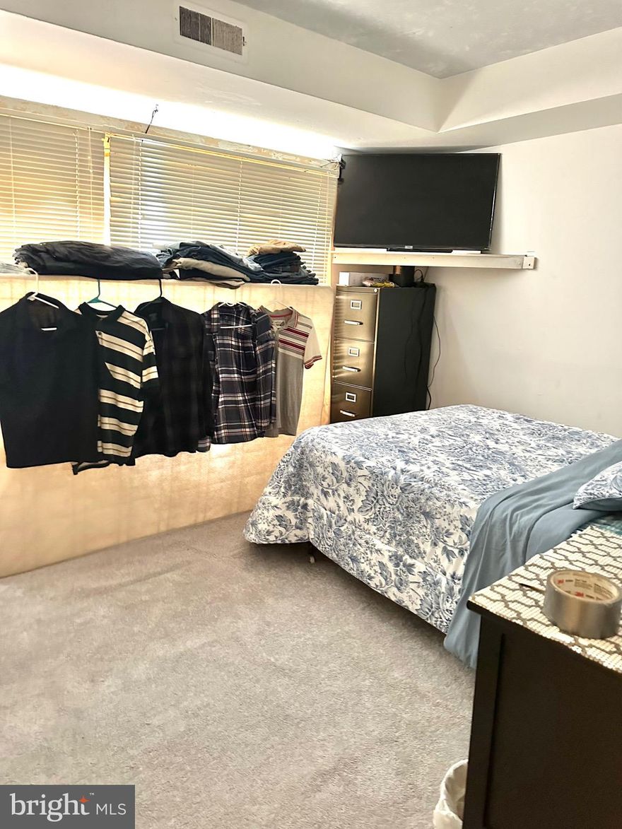 Don’t miss this incredible chance to invest in a 3-bedroom, 1.5-bath condo with large patio offered way below market value! This property is being sold as-is, making it a perfect opportunity for investors looking to maximize their return.  Located in a highly sought-after area with water and gas included, this condo offers great value in a prime location.  Enjoy the community amenities like outdoor swimming pool, tot lot, and picnic areas. Located just minutes away from shopping centers, Mosaic District and Tysons Corner. two of the region's most vibrant shopping, dining, and entertainment hubs.  Easy access to Route 29, R 7, R 50, R 66, and I-495. Commuting is a breeze with buses to Metro Stations nearby. Ample parking is available throughout the day for you and your guests. Storage unit and laundry facilities are conveniently located in the basement of the building. The community offers security services from 8:00 pm to 4:00 am. Plus, it's situated in a top-rated school district, adding even more appeal.
Whether you're looking to renovate and resell or hold for rental income, this property presents a promising investment opportunity. Act quickly—opportunities like this don't last long!