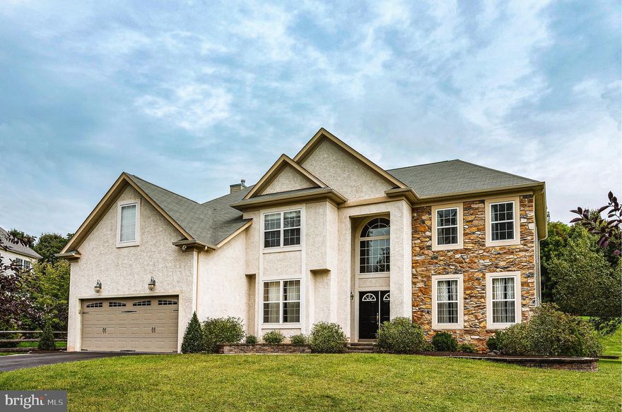 LOCATION LOCATION LOCATION!! Welcome to 241 Creekside Drive, where the sun rises and sets.  The most desirable lot in the Reserve at North Pointe. Adjacent to this beautiful home you have spectacular open grounds with breathtaking vacation-like views. Looking out the front, you will enjoy roughly 100 acres of Preserved Solebury Parkland with a serene creek  that flows through. This fabulous home offers privacy and backyard seclusion, but is conveniently located to commuter routes, shopping, blue ribbon schools, recreation, and all that the heart of New Hope area offers.  Enter double doors into a gracious sun-drenched foyer with an elegant tile floor, dramatic staircase and a stunning chandelier. To the right is a spacious dining room with rich hardwood floors; to the left are more French doors, leading to a large newly remodeled office, making working from home comfortable and convenient. The kitchen is a cooks delight, with ample granite counters, spacious cabinetry, stainless appliances, a breakfast bar and stylish pendant lights. There is a sliding glass door linking the eat-in area to the extensive stone patio and the backyard beyond. Perfect for entertaining!! The kitchen opens to the welcoming family room which is centered on a massive 14 ft floor to ceiling stone fireplace. Here again, gleaming wood floors add warmth and charm. The family room features a lovely bonus room with a wall of windows and sliding glass doors to the patio, adding to the brightness of this wonderful room.  A mudroom adjacent to the garage and family room provides a generous amount of additional storage including a useful utility sink.  A powder room completes the main level. Upstairs is a sumptuous main bedroom with a tray ceiling, an enormous walk-in closet and a tile en suite bath which has newly added marble counter tops. Three additional bedrooms, a convenient laundry room with lots of storage, and completely remodeled marble and tiled hall bath complete the second floor.  Going down to the lower level you will find an oversized partially finished basement, plumbed for a full bathroom which would be perfect for an In- law suite or game room. The rear of the home is designed for relaxation and fun with its generous paver patio, overlooking sweeping lawns, and even a sledding hill!  Flagstone slabs with an arc of stone seating awaits your fire pit for chilly nights. This wonderful home is served by the prestigious New Hope-Solebury School District. It is located 15 miles from Princeton, 33 miles to Philadelphia, 47 miles to Newark Airport and 68 miles to the Holland Tunnel. Conveniently located to trains and airports.