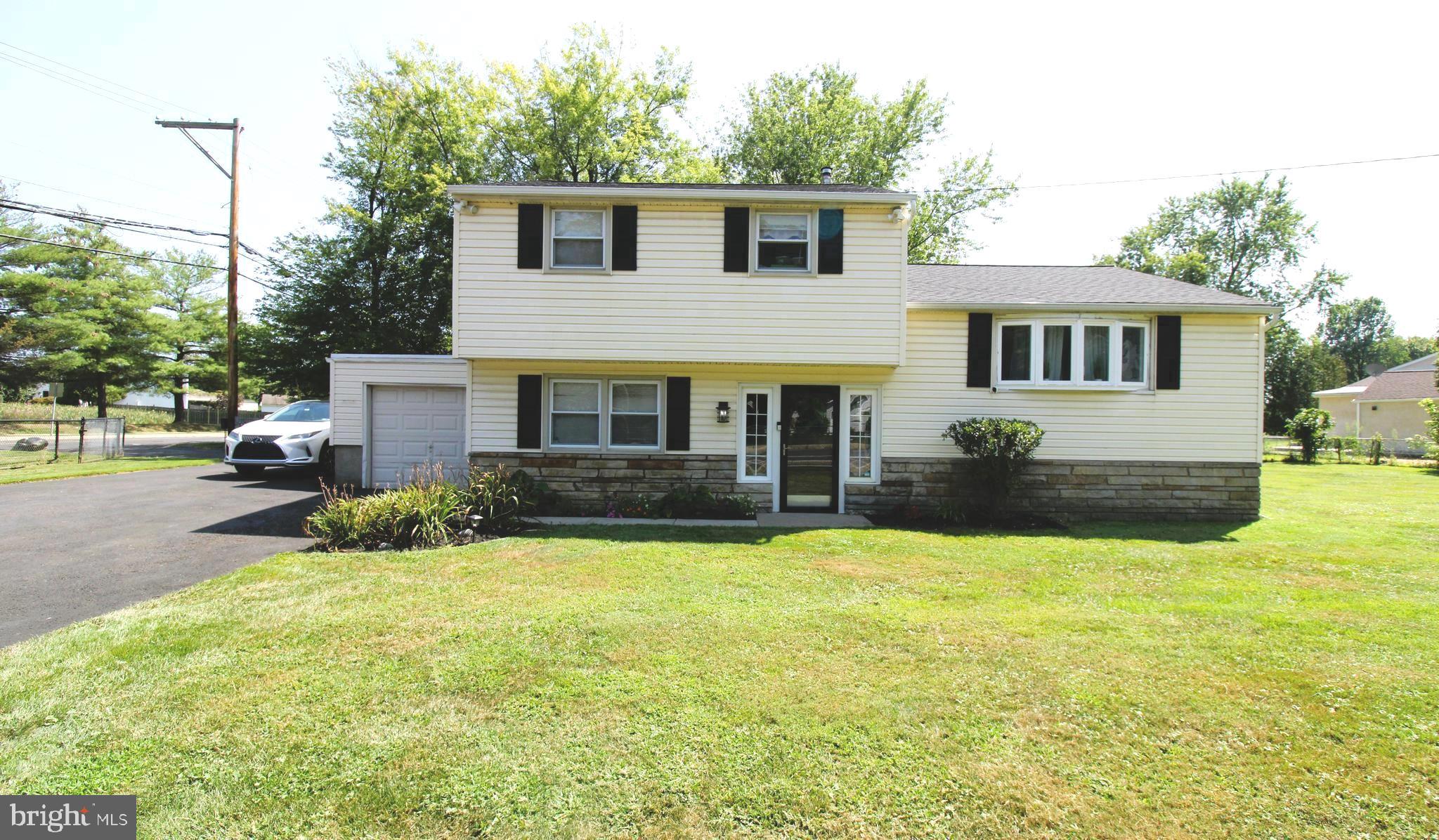 Welcome to 3755 Mechanicsville Rd. – A Home of Beauty, Space, and Elegance! Step into this stunning single-family home in the heart of Bensalem, where charm meets functionality in every room. This move-in ready gem boasts an impressive layout and thoughtful updates throughout. Step into the beautiful foyer entrance with the "Bonus Room" immediately to your left. Just a few steps up to the main level which features a spacious living room where you will enjoy a bright and airy atmosphere with a gorgeous bow window and a seamless open concept flowing into the dining area and kitchen. The kitchen is well-appointed with ample cabinets and generous counter space, perfect for meal prep and entertaining. The split-level design means not too many steps! Upstairs, you'll find Three really nice-sized Bedrooms with plenty of closet space for comfort and convenience and a beautifully updated full bath with elegant ceramic tile flooring and a beautifully tiled tub surround. The lower level boasts a huge bonus room that can easily serve as a fourth bedroom, plus a convenient half bath and laundry room with access to the backyard. The exterior includes a one-car garage, a large driveway, EP Henry retaining wall, and a fully fenced yard—ideal for outdoor enjoyment. Finished with vinyl siding, stone accents, and a dimensional roof, this home offers curb appeal and peace of mind. Whether you're entertaining guests or enjoying a quiet evening at home, this home has it all.📞 Schedule your private tour today and make this dream home yours!