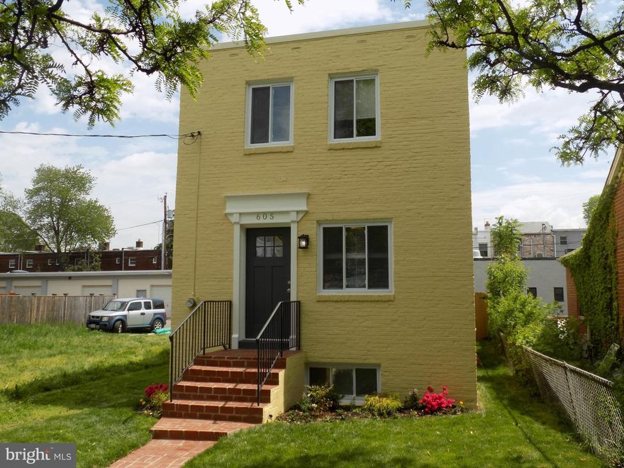 REMODELED ROW HOUSE. 1208 finished sq ft on the main & upper lvl. Rec m w/ 424 finished sq ft (78 sq ft unfinished) basement stairwell walkout. Features include: New kitchen w/ gas range & full appliance package, finished hardwood flrs, full upper bath with marble tile and vanity, full bath in lower level w/ over sized shower, family rm, large rec rm & parking space. OPEN SUNDAY 1-4.