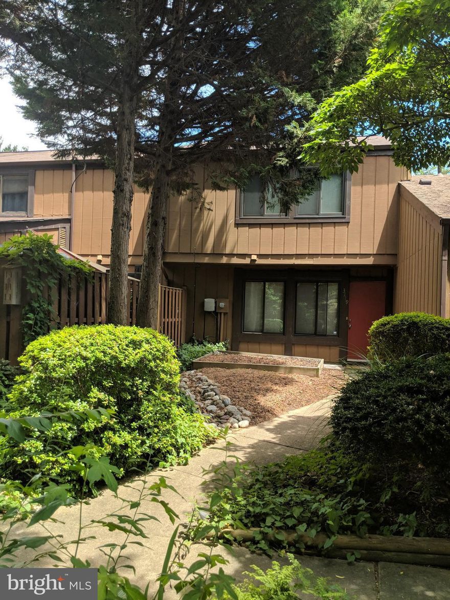 Avail July 1. Great price for amazing location and beautifully updated town home. Gorgeous kitchen with Stainless Steel appliances, granite counter tops and new cabinets! Gleaming hardwoods on lower level.  3 large bedrooms and 2.5 remodeled baths. Mature landscape thru out lovely community. All this so close to shops,restaurants, services and more.