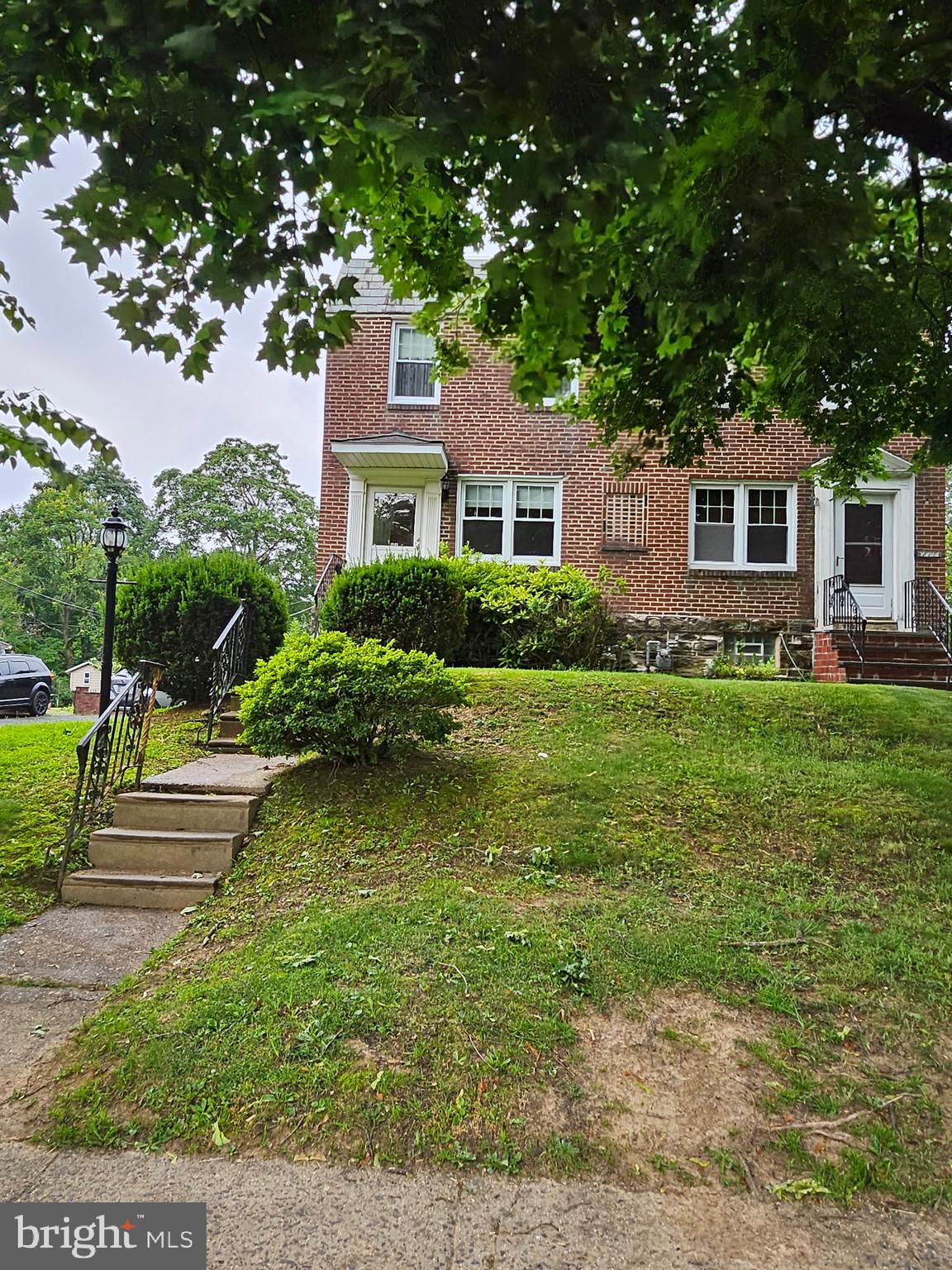 Welcome to 7802 Beech Lane — a charming brick twin home on a quiet street in the heart of the Wyndmoor/Glenside area. This 3-bedroom, 1-bathroom property offers timeless curb appeal, and endless potential to make it your own.
Step inside to find a spacious living room with large front windows that fill the home with natural light. The original parquet hardwood floors carry throughout the main living spaces and into the bright dining room. The galley-style kitchen offers plenty of cabinet and counter space and great views of the backyard.
Upstairs, you’ll find three bedrooms with original hardwood flooring and a vintage pink-tiled full bathroom, waiting for your personal touch.
The finished lower level is full of character with its retro red carpeting, wood paneling, and a cozy den area — perfect for a game room, movie space, or home office. The basement also features a laundry area and additional storage.
Step out back to enjoy a large, yard — a rare find! Whether you’re looking for a space to entertain, garden, or relax, this backyard offers great potential.
Convenient location
Less than two miles from historic Germantown Ave in Chestnut Hill, which is home to lots of restaurants, bars, boutique shops ,and a farmers market. Transportation is convenient…Wyndmoor Train Station is one mile from the home with only a 20-minute commute to Center City, Philadelphia. Just minutes walk to local eateries, coffee shop, bars and stores