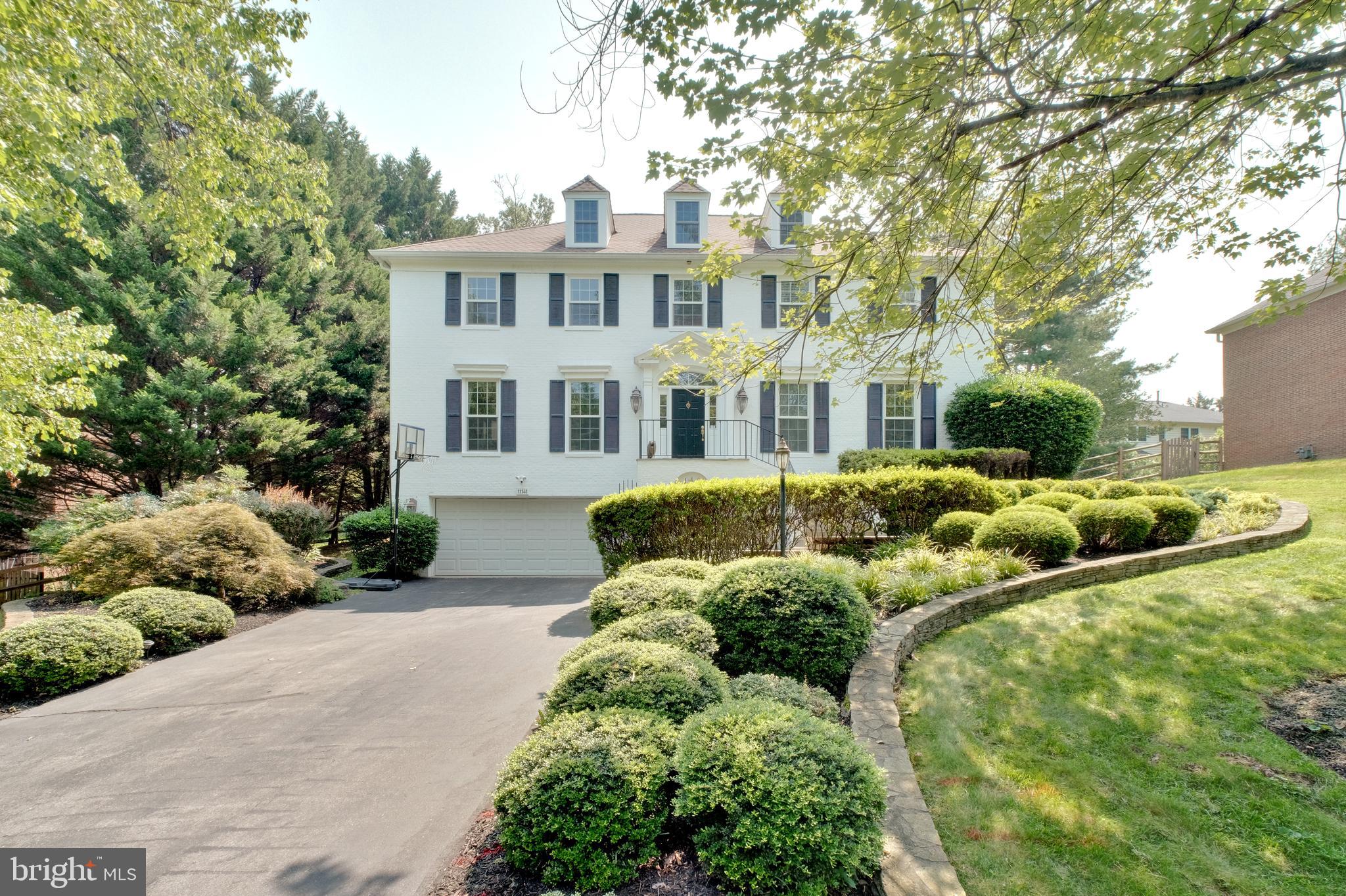 Welcome to Luxury Living in the Heart of Normandy Hills!
Step into this stunning 5-bedroom, 4.5-bath colonial nestled in the prestigious Normandy Hills community. From the moment you enter the sun-drenched foyer, you’re greeted by an elegant curved wooden staircase that sets the tone for the sophisticated design found throughout the home.
Off the grand entryway, you'll find a formal living room and an expansive formal dining room—ideal for entertaining guests or hosting special occasions. Continue through the main level to the heart of the home: a gourmet kitchen outfitted with premium stainless steel appliances, including a double oven and a sleek Bespoke refrigerator. The kitchen also features granite countertops, abundant cabinetry, and a cozy breakfast nook that opens directly to the spacious backyard deck.
Just beyond the kitchen, a second living room with soaring vaulted ceilings invites relaxation and gatherings, seamlessly blending indoor and outdoor living. A stylish powder room on the main level adds convenience for both residents and guests.
Upstairs, retreat to the luxurious primary suite, which includes a private sitting area or home office, multiple walk-in closets, a dressing area, and a spa-inspired en-suite bath. Three additional bedrooms, each with their own full bathrooms and walk-in closets, offer comfort and privacy for family or guests. An upstairs laundry room adds a layer of everyday ease.
The fully finished lower level is designed for versatility, perfect as a home theater, fitness center, or game room. It includes a spacious fifth bedroom, a full bath, and a private walk-out entrance to the front of the home, ideal for guests or an in-law suite.
Additional highlights include beautiful hardwood flooring throughout, recessed lighting, designer light fixtures, an oversized two-car garage with extra storage space, and an extended driveway that accommodates up to four additional vehicles.
This home offers the perfect blend of space, style, and sophistication—all in an exceptional location. Don't miss the opportunity to make this extraordinary property your own. Schedule your private tour today!