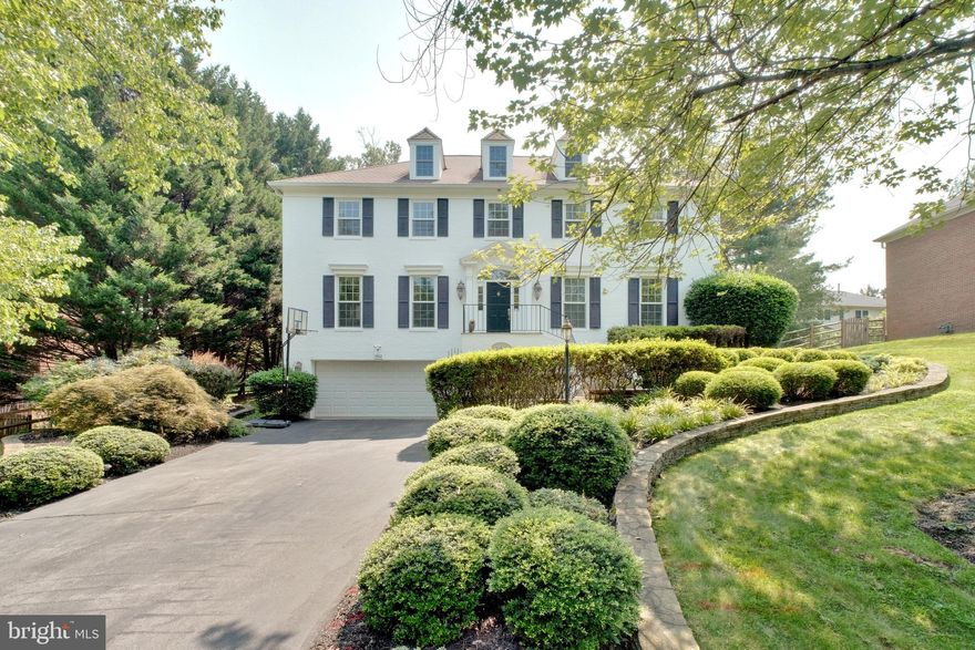 Welcome to Luxury Living in the Heart of Normandy Hills!

Step into this stunning 5-bedroom, 4.5-bath colonial nestled in the prestigious Normandy Hills community. From the moment you enter the sun-drenched foyer, you’re greeted by an elegant curved wooden staircase that sets the tone for the sophisticated design found throughout the home.

Off the grand entryway, you'll find a formal living room and an expansive formal dining room—ideal for entertaining guests or hosting special occasions. Continue through the main level to the heart of the home: a gourmet kitchen outfitted with premium stainless steel appliances, including a double oven and a sleek Bespoke refrigerator. The kitchen also features granite countertops, abundant cabinetry, and a cozy breakfast nook that opens directly to the spacious backyard deck.

Just beyond the kitchen, a second living room with soaring vaulted ceilings invites relaxation and gatherings, seamlessly blending indoor and outdoor living. A stylish powder room on the main level adds convenience for both residents and guests.

Upstairs, retreat to the luxurious primary suite, which includes a private sitting area or home office, multiple walk-in closets, a dressing area, and a spa-inspired en-suite bath. Three additional bedrooms, each with their own full bathrooms and walk-in closets, offer comfort and privacy for family or guests. An upstairs laundry room adds a layer of everyday ease.

The fully finished lower level is designed for versatility, perfect as a home theater, fitness center, or game room. It includes a spacious fifth bedroom, a full bath, and a private walk-out entrance to the front of the home, ideal for guests or an in-law suite.

Additional highlights include beautiful hardwood flooring throughout, recessed lighting, designer light fixtures, an oversized two-car garage with extra storage space, and an extended driveway that accommodates up to four additional vehicles.

This home offers the perfect blend of space, style, and sophistication—all in an exceptional location. Don't miss the opportunity to make this extraordinary property your own. Schedule your private tour today!