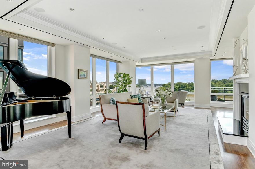 Stunning penthouse unit with panoramic views of the Potomac and all the amenities of the Ritz Carlton. 4 bedrooms, 4.5 bath with high-end, custom finishes throughout. Luxurious master suite has a private balcony, large closets and extensive master bath. 3 other bedrooms with full baths. Gourmet eat-in kitchen opens to breakfast area and family room. Includes 2 car parking.