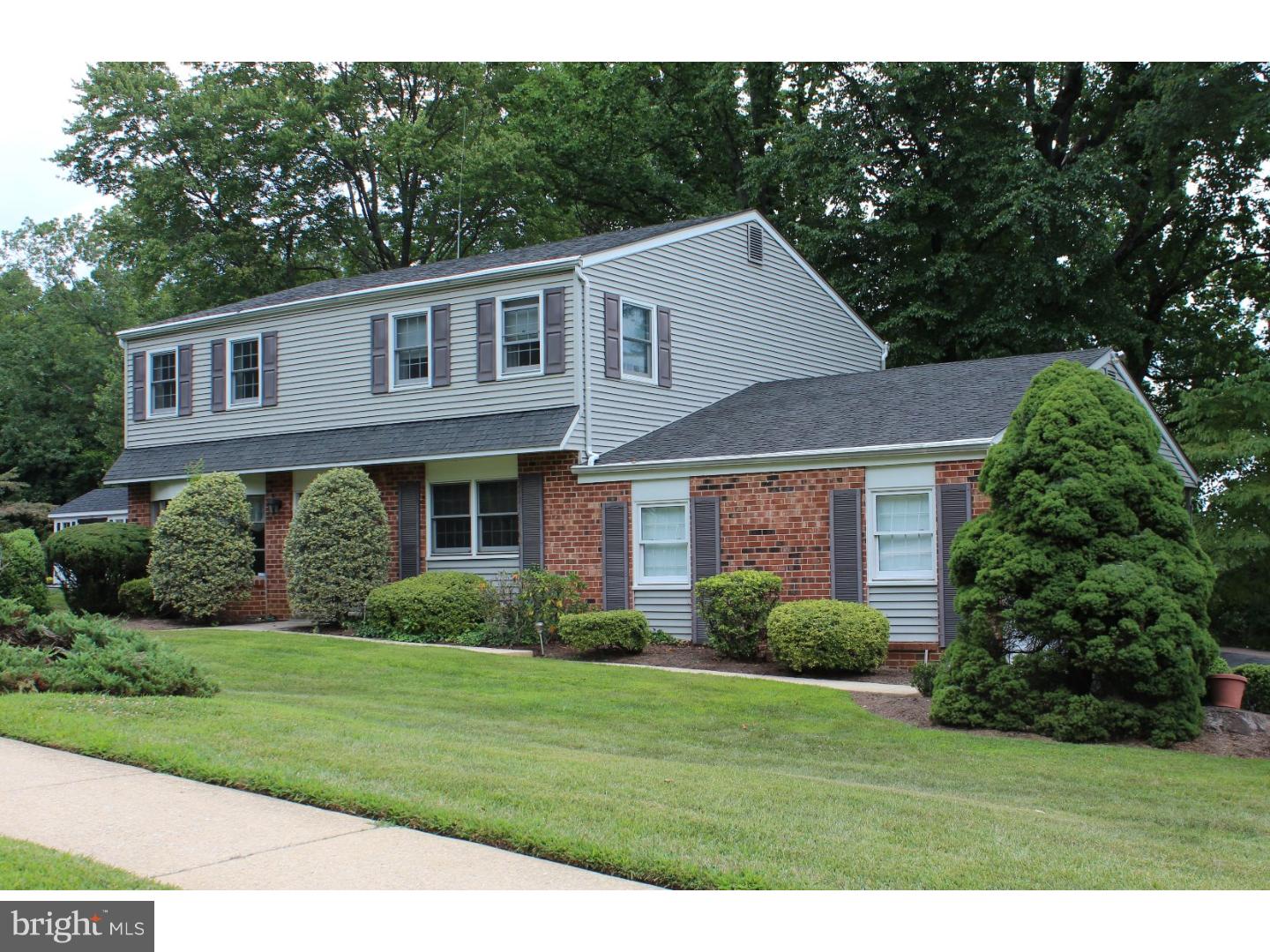 Step through the double door front entrance of this beautifully maintained spacious Colonial home located in the Parkwynne Estates section of Marple Twp. Situated on a quiet cul-de-sac, this 45 year old home was customized by the Original homeowners as they worked closely with the builder to include many upgrades such as the brick work around the entire lower level of exterior. You will also find the Old Colonial charm of a full brick wall and wood burning fireplace in the cozy family room.  Beautiful updated country kitchen with GE Stainless Appliances and beautiful Hickory cabinets and flooring.  Convenient Powder room located off the center hall.  The Master suite includes two walk-in closets, dressing room and full shower stall.  Three large bedrooms share the full hall bath.  A large patio leads around to the 3 year old deck overlooking treed lot. There is a wonderful finished basement with large work shop and plenty of storage. Bay windows, custom built cabinets in dining room. Too many upgrades to list. Call for an appointment to see this wonderful family home.