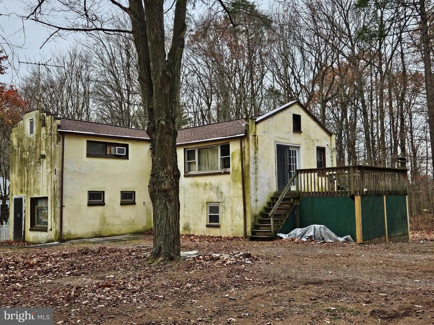 This two-story home features a classic stucco exterior and plenty of potential for those ready to bring it back to life. With solid structure and timeless charm, this property offers a great opportunity to update and make it your own. The layout provides flexible living space, and the exterior's architectural style gives it standout curb appeal.

While the home is in need of repairs and cosmetic updates, it's a great option for investors, renovators, or anyone looking for a project with lasting value. A little vision and care could truly make this home shine again.