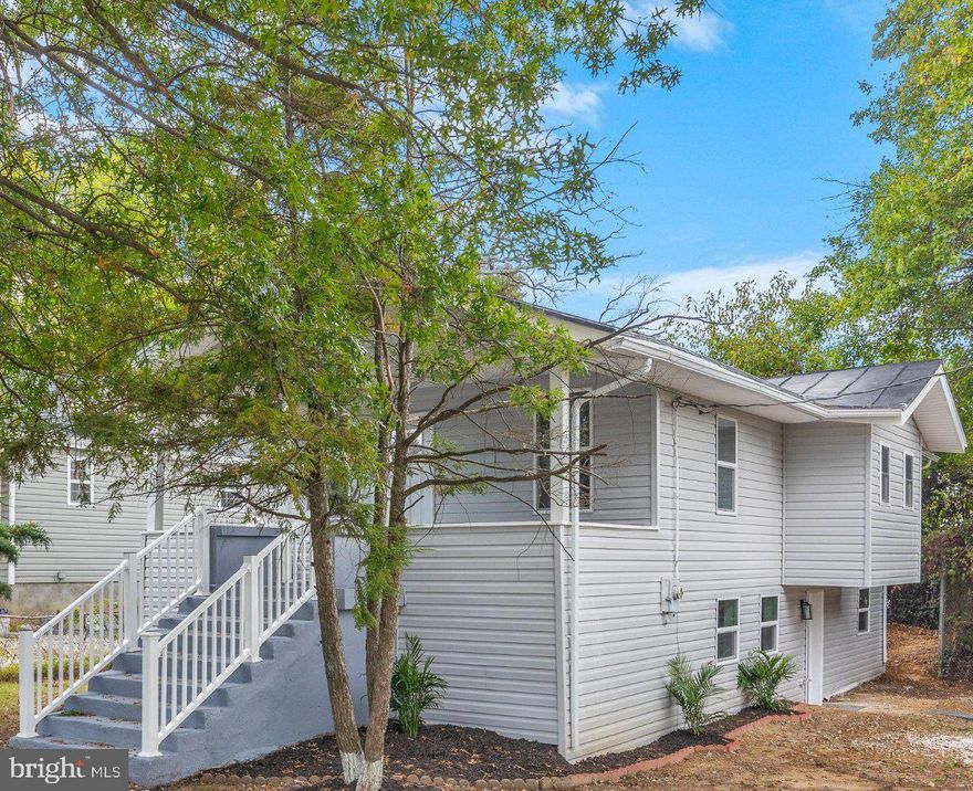 Beautifully renovated and improved spacious  home with 5 Bedrooms & 3  Full Baths. New Floors, New Paint, New Windows & Doors, New kitchen with upgraqded SS appliances.  Fully finished walk out basement with an in law suite for a 2 household environment.