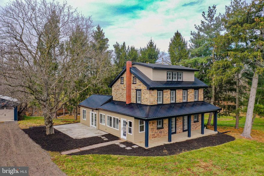 Step into this exquisite, meticulously restored farmhouse, accompanied by a two-story barn and three horse buildings, creating a haven that seamlessly blends elegance and functionality. Revel in the grandeur of vaulted ceilings, sleek quartz countertops, and a brand-new steel roof that crowns this stunning abode. Boasting 3 bedrooms and 2.5 bathrooms, this residence is a complete package for your family's desires.  The well-equipped kitchen, adorned with modern appliances including a stove, oven, microwave, and dishwasher, invites you to effortlessly prepare homecooked, farm-fresh meals. Appreciate the convenience of a hot water baseboard heat and an oil-fired furnace on the first floor, perfect for those chilly winter nights. The new Low-E window glass ensures a consistent temperature throughout the seasons.  Ascend to the 3rd-floor master bedroom, a sanctuary complemented by a home office and a walk-in closet. The second-floor bathroom features a beautiful double vanity, while the first-floor laundry room adds practicality to daily life. Step outside onto the 14’x28’ patio, an idyllic space to savor warm summer evenings, overlooking a stream adjacent to your historic home.  The two-story barn is not just utilitarian; it is a spacious and comfortable venue for entertaining guests. With 11 horse stalls, water supply, a climate-controlled rider’s lounge/fitness area, hay storage on the 2nd floor, bathroom, and a kitchenette, this barn is a distinctive space for memorable events. The property also features three horse buildings, each offering unique amenities.  The first building, an expansive 50’x200’ structure, houses 16 horse stalls, an indoor riding arena, saddle prep stalls, washing/grooming area, utility room, saddle storage room, tack room, and a med room. The second building, with 17 stalls attached to the arena, includes a two-speed motorized exercise trainer and an oversized bedding/manure staging area. The third building, smaller in size, provides 4 stalls with water and a convenient workshop area.  Upgrades abound throughout the property, including a newer heat pump, auxiliary 3-zone electric baseboard heat, water softener, UV light, hot water heater, and septic system. A newer 300’ well delivering 9gpm ensures excellent water pressure for efficiently caring for horses. The two-car garage with openers protects your vehicles from the elements, and the farm includes run-in shelters in the pasture. This remarkable horse farm is a complete package with its historic farmhouse, impressive barn, three functional horse buildings, and numerous extras. With unparalleled amenities and upgrades, this property is a rare find. Don't miss the opportunity – call today to schedule your private tour and experience the timeless charm and functionality this property has to offer!