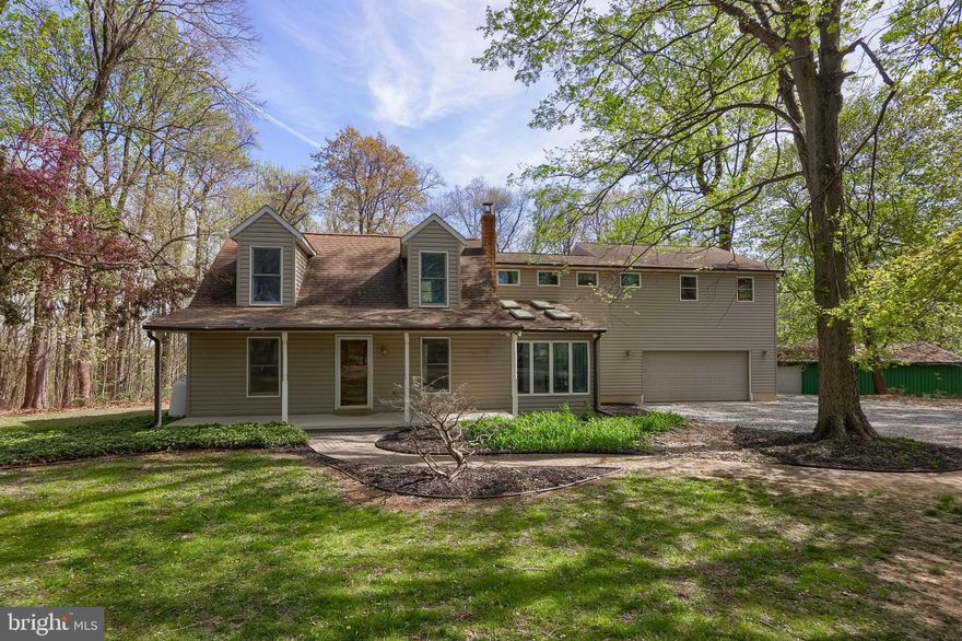 Situated on a sprawling 6.94 acres, this secluded 4 bedroom, 2 bath home is a true haven for nature lovers. A quarter-mile private driveway leads to this tranquil retreat, which adjoins the expansive 340 acre Appollo Park and offers easy access to hiking adventures along the renowned 196-mile Mason Dixon Trail. Imagine unwinding in the two-story sunroom, where panoramic views of local wildlife create a serene backdrop to daily life. A multi-tiered deck invites outdoor relaxation, while an oversized two-car garage provides ample space. For car aficionados or hobbyists, a substantial 24x48 pole building with a convenient roll-up door offers endless possibilities. Adding to the allure, the Susquehanna River is just minutes away, completing this exceptional property.