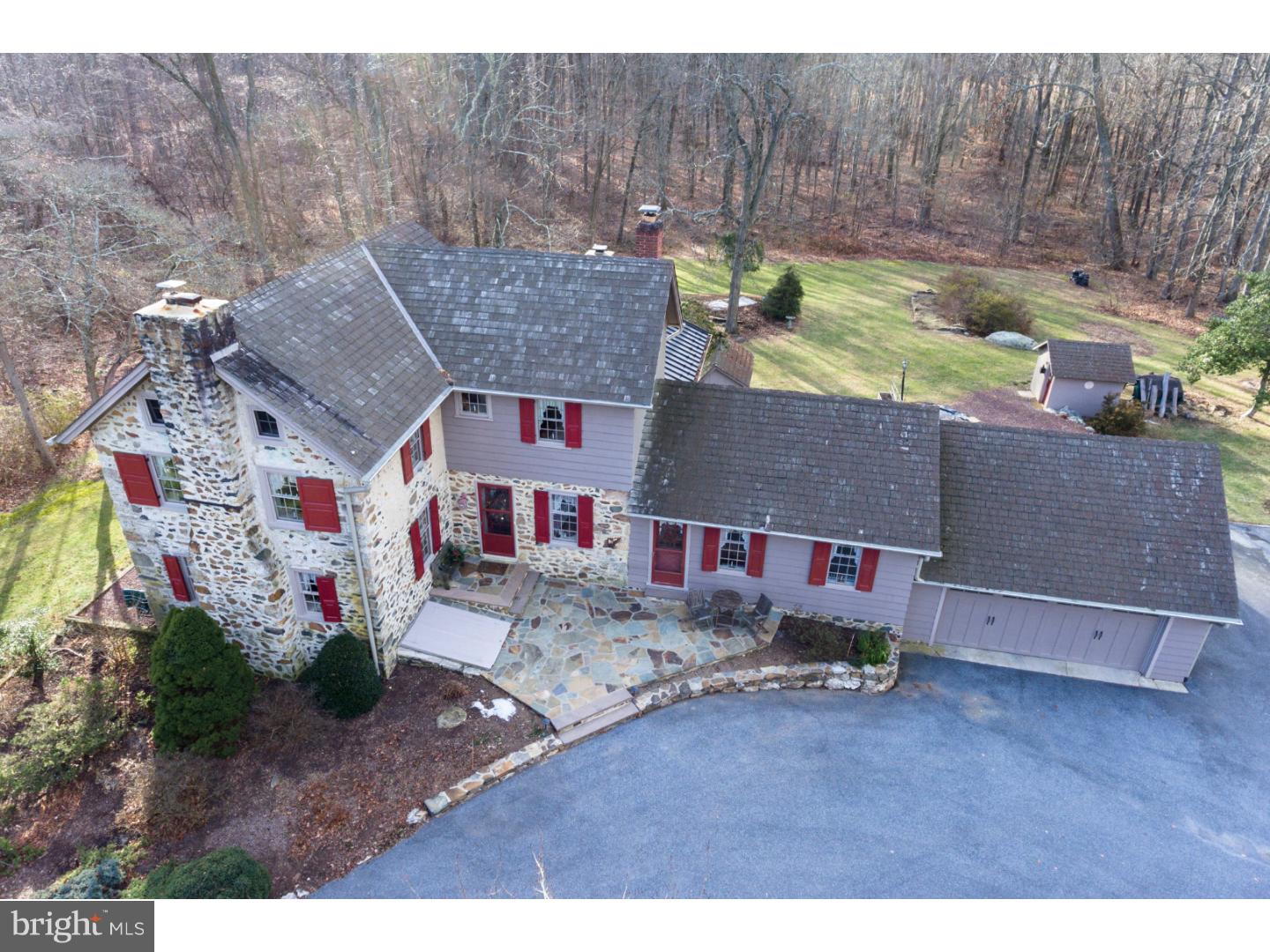 VINTAGE GLORY! The long tree-lined drive, the perfect 4.4 acre setting and exquisitely restored,updated historic home (circa 1790s with later additions) create a heavenly Chester County haven. Your heart will soar with delight at the kaleidoscope of perennial gardens, flowering shrubs and colorful trees that boast four seasons of Longwood Gardens-like panorama. The stocked pond provides endless enjoyment with fishing fun, a lazy canoe float or just relaxing by the glimmering water. Stroll the meandering garden paths, romp in the bountiful yard space and entertain on the inviting front, side and rear patios--this is truly an oasis amidst today's busy lifestyle! Inside, antique details and desirable upgrades highlight and blissfully blend old and new in this exceptional, move-in ready residence. Gleaming random width wood floors, stone flooring, restored iron hinges, exposed stone wall, deep window sills, rich trim, beamed and volume ceilings, skylights, three rugged stone fireplaces, honed granite kitchen counters and sleek updated tile bath are just a few of the marvelous special features that abound. Mesmerizing views fill every window as the splendid gardens and trees provide an ever-changing viewscape. The dramatic great room with volume, sky-lit, beamed ceiling, ample windows, rustic stone accents including imposing stone fireplace with cozy stove, will simply capture your heart! It invites comfortable relaxation and provides ample entertaining area! The formal dining room/stone fireplace awaits your finest dinners or easy family pizza night! The adjoining, open living room offers a pleasant conversation area. The keeping room/stone fireplace is a cozy reading/parlor nook. A sunny, neat-as-a-pin, eat-in-kitchen and adjoining butlers pantry/laundry form a pleasing meal prep/task/casual dining center--so pleasant to gaze over the dazzling rear landscape as you create culinary delights. The breathtaking seasonal views fill every angle of the 2nd floor windows. Classic colonial niceties adorn the second floor creating a quaint bed and breakfast aura--roomy master BR, 2 addtl serene BRs, exemplary custom bath/vaulted, skylit, beamed ceiling & full walk-up attic complete the upper levels. The meticulous homeowners have taken great care to establish a combination of old home charm and upscale modernity tucked amidst imaginative gardens, expansive pond-accented grounds and sylvan seclusion--a masterpiece of delight!