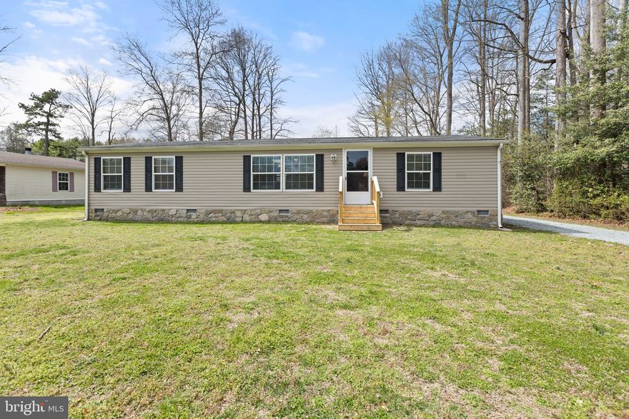 here are the TOP 10 features of this fine home- 
1/ 3 bedrooms found in this ONE FLOOR living opportunity 
2/ two large bathrooms both with bathtubs and the primary bath also features a shower stall. 
3/ large kitchen work area with an island allowing for seating 
4/ handy walk in kitchen pantry 
5/ MAIN floor laundry room with washer and dryer 
6/ large great room area...featuring the best place to appreciate the open feeling from the vaulted ceilings! 
7/ well cared for by the current owners - just move right in! 
8/ plenty of storage both inside and ....(check out #9) 
9/ looking for a huge garage...even big enough to potentially fit your boat?   See how a Quonset Hut building makes that a reality! 
10/ just minutes from Broadkill and Lewes beaches and the rest of what the Delaware Beach towns have to offer. 
make your appointment today to visit this home in person....then see if your TOP 10 list matches ours...and then, make it yours.