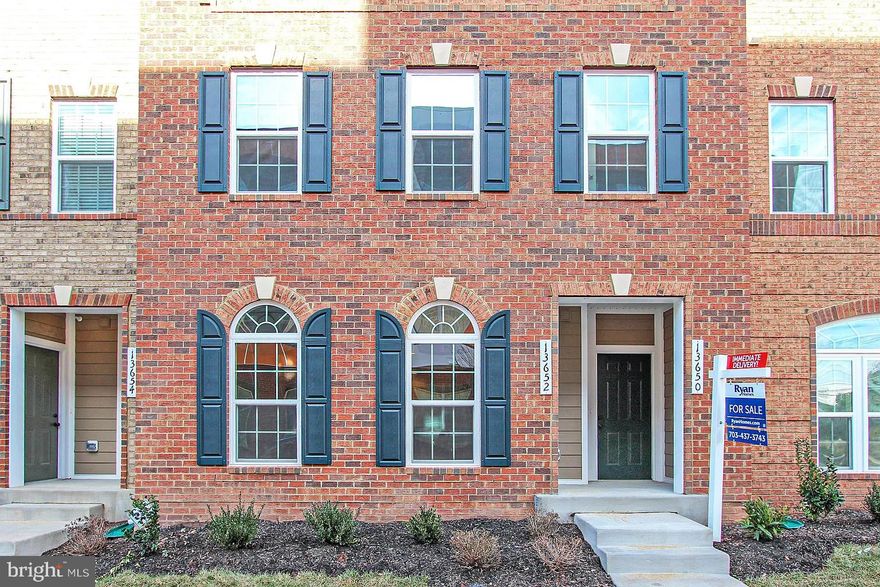 Available February 2026. Two level townhouse-style condo located at Discovery Square in Herndon. Built in late 2016. Exceptional 3BD, 2.5BA 1600+ sqft unit includes One car garage and Driveway. Main open floorplan w/ hardwood floors. Counter-height breakfast bar w/ Granite counters. Gas cooking and Walk-in pantry. Carpeted second level w/ conveniently located Laundry room. Spacious primary suite has two large Walk-in closets and private Ensuite w/ Dual vanities and Shower stall w/ Dual showerheads. Balcony access off of second bedroom. Water and trash included w/ rent! Located in a highly-rated school district (Elementary & Middle both rated 10). Minutes to 66, 28, 50 & 267. Minimum security deposit equal to one month's rent. No pets, no smoking.