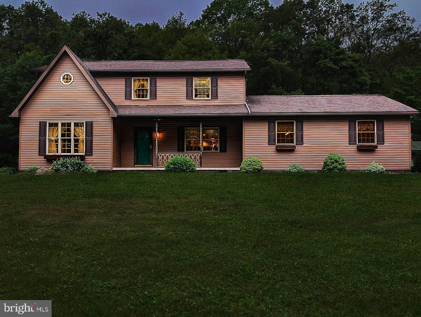 Looking for the kind of place you never want to leave? This extraordinary 160-acre property offers the perfect blend of natural beauty, total privacy, and a well-built home that's ready for whatever lifestyle you're dreaming of—whether it's homesteading, hunting, weekend retreats, or full-time country living.
Tucked far from the road, the custom-built 4-bedroom, 2.5-bath home was designed for comfort and longevity. Built by Bill Waltman in 1998, it features superior walls in the basement, heated, newer hot water heater, outdoor wood furnace, baseboard oil heat, and a whole-house water filter. The outdoor furnace will heat all 3 zones of the house as well as heat the hot water for the house. There's an enclosed sunporch for quiet mornings, central vac for convenience, and even a root cellar under the porch for your homegrown harvest. Upstairs, a bonus office space is already plumbed and could easily become a second upstairs full bath.
The land is where this property truly shines—160 acres of pure Pennsylvania wilderness with some timber value, trails for ATVs or hiking, and two large pole buildings (electric to both, and large overhead storage in one of them) ready for your equipment, toys, or business needs. A newer well pump ensures reliable water, as well as a second well on the property and the peaceful setting ensures you'll hear more birds than cars.
Property is located minutes away from Pennsylvania State Game Lands offering miles of public hunting, fishing, and wildlife watching terrain. Winter sports are within reach with Blue Knob Resort around 30 minutes away, ideal for skiing or snowboarding getaways. Be at Shawnee Lake within minutes.
This is more than a home. It's peace. It's a place to put down roots and live the way you've always wanted—with space to breathe, room to grow, and the kind of privacy you can't put a price on.