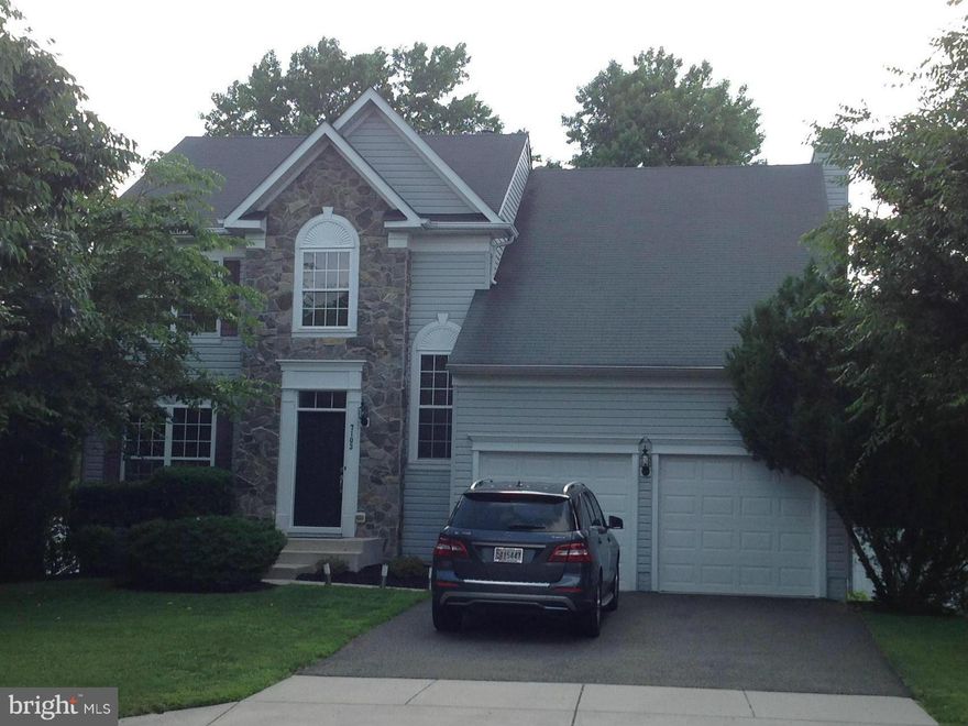 This Beautiful Stone Front Home Comes Complete With Hardwood Floors, Stainless Steel Appliances, Crown Moulding, Custom Wood Blinds, Sep Dining Room, Family Room With Fireplace, Newly Landscaped,  Back Yard  With Deck & 6 Ft. Maintanance Free Privacy Fence, 2 Car Garage, New Front Door, Heavily Insulated Garage Doors W New Motor(2014) Hot Water Heater(2014) Home Warranty & So Much More! Must See!