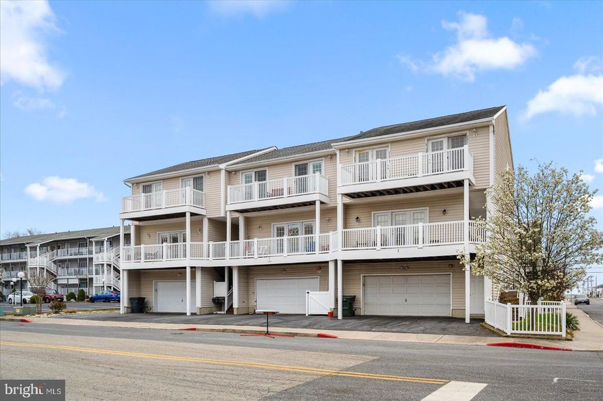 Unique townhome with a prime location in Ocean City, Maryland.  This townhome offers three bedrooms, two full-bathrooms, one half-bathroom, an open living area, multiple balconies, garage and a fenced in yard-area.  The living level is located on the second floor and features a large living room with a gas fireplace, dining area, half-bathroom and a fully-equipped kitchen with stainless-steel appliances and a convenient breakfast counter.  Vinyl plank flooring has been installed throughout the entire living level.  The home’s end-unit location allows for a lot of nice, natural light and an open feel.  There is a nice-sized balcony located off of the living level that is a great place to relax and unwind after a long day at the beach or on the water.  The large master bedroom features an ensuite full-bathroom with dual vanity sinks, soaking tub and a separate shower.  There is a second balcony located off of the master bedroom that offers peeks of the bay and neighboring Harbour Island marina.  Both guest bedrooms are generously sized with the second full-bathroom being centrally located between the two for easy access.  The ground level features the garage, driveway and a unique fenced-in side-yard area that is great for your pets and additional outdoor living space.  No condominium association or HOA fees.  The home’s location is tough to beat.  It is uniquely situated in a relatively quiet residential area, yet is only a short walk from the beach, boardwalk, shopping, amusements, restaurants, water-sports, coffee shops, Harbour Island marina and more.  This is a great value for a large, unique townhome with a prime location.  Schedule your private showing today.