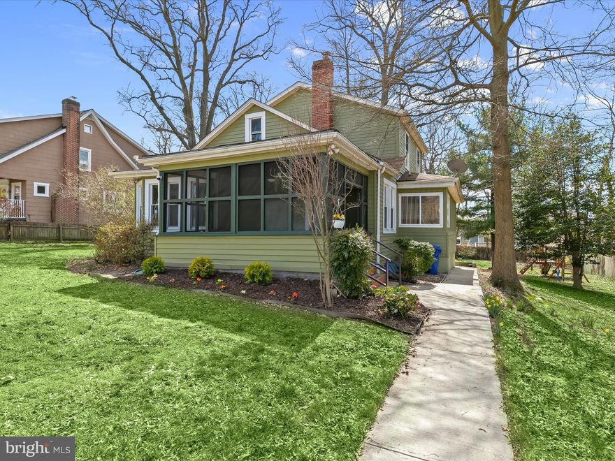 Discover serenity in this stunning Craftsman-style 4-bedroom, 2.5-bath home, nestled on nearly half an acre of partially wooded land in the sought-after Taylor Heights neighborhood. From the moment you arrive, the charm is undeniable—starting with the inviting front screened porch, where gentle breezes and warm sunlight set a tranquil tone. Step inside to an open and welcoming main level, where the living room exudes warmth with rich hardwood floors, an on-trend color palette, crown molding, and a classic brick wood-burning fireplace. A cozy bay-window nook offers the perfect retreat for reading or relaxing. The dining area, tucked into another sunlit bump-out, is ideal for both casual meals and intimate gatherings. The heart of the home—the gourmet kitchen—features gleaming granite countertops, stainless steel appliances, and seamless access to the incredible rear screened-in porch. Here, your culinary skills will shine as you prepare meals in a space designed for both function and style. Also on the main level, the primary suite offers a peaceful escape with its own beautifully tiled en-suite bath. A convenient powder room and a bright, airy laundry room complete this floor. Upstairs, three additional bedrooms provide ample space, including one with a generous walk-in closet. The upper-level bath is equally impressive, showcasing detailed tile work. The unfinished lower level presents endless possibilities—transform it into a home office, gym, or recreation space tailored to your needs. Outside, a private backyard sanctuary awaits. Fire up the custom-built brick barbecue on the stone patio, perfect for summer gatherings. The fully fenced yard adds privacy while offering a serene backdrop of mature trees. Ideally located near I-695, MD Route 147, Double Rock Park, and Towson Town Center, this home offers the perfect blend of comfort, convenience, and timeless appeal. Don't miss your chance to make it yours! Note:  Select interior photos have been virtually staged