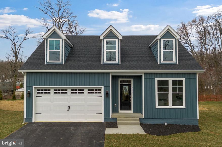 This brand-new Fairhaven Cape Cod by Greenspring Homes is officially finished and ready for a Spring move-in at Water’s Edge on Sue Creek. Designed for those who want to age in place without sacrificing style, this fresh build features a rare main-level primary suite and an additional first-floor bedroom/office. The open-concept interior flows from a gourmet kitchen with a large island into a fireside family room, while the second floor offers two spacious guest bedrooms and a full bath. Skip the construct timeline and move straight into a home that backs to serene woods. Walk through the private community gate into the yacht club with waterfront dining and boat slips.