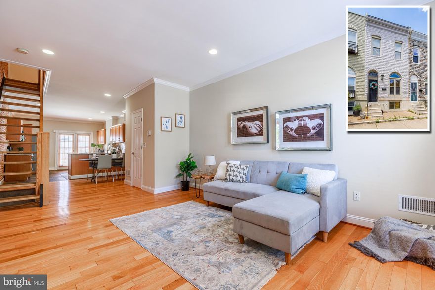 PICTURE PERFECT PATTERSON PARK ROWHOME WITH 3 FINISHED LEVELS AND LOCATED STEPS FROM PATTERSON PARK! Features include an open floor plan, spacious living room w/ crown molding and exposed brick, expansive kitchen w/ ss appliances, granite counters, and TONS of cabinet space, & main level half bath.  The upper level offers 2 large bedrooms and a hall bath w/ a walk-in shower and separate whirlpool tub.  The finished basement has a bonus room that could be used as a family room or even a 3rd bedroom and a laundry room w/ storage space.  The rear patio is a great place to entertain or you can easily convert it to a parking pad!  Perfectly located 1 block from Patterson Park and convenient to Johns Hopkins!