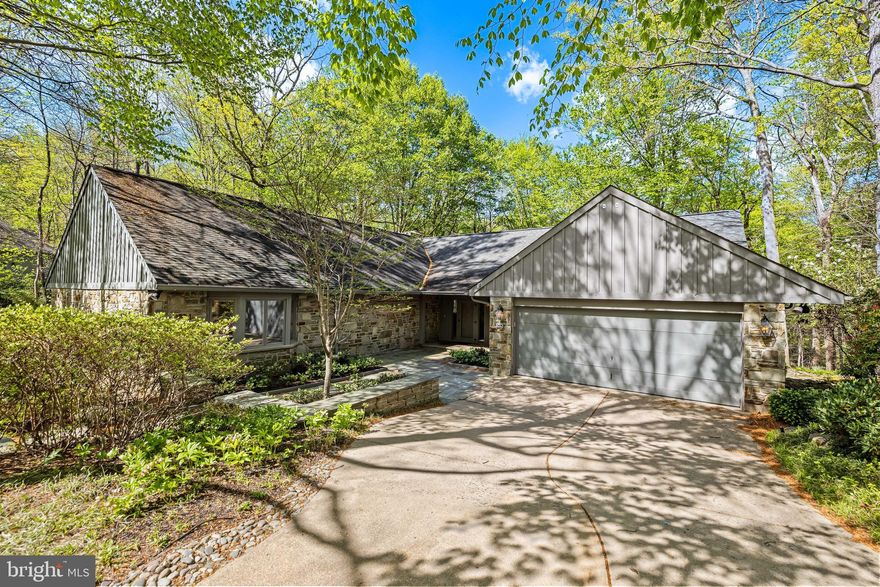 Rarely available! This spacious DETACHED sprawling rancher in the sought- after gated community of Rockland offers modern comfort & easy living.  A grand entry foyer welcomes you into the formal living room with a striking stone fireplace. There are gleaming hardwood floors & crown moldings found throughout this fabulous home.  The elegant dining room is perfect for hosting gatherings.  It features double closets with glass shelving & a beautiful custom wall unit. The expansive family room is a wow, boasting high ceilings, an abundance of windows & custom built-ins providing the perfect space for relaxation & entertainment. This room & the kitchen flow seamlessly to a wonderful, screened porch overlooking a serene, treed backyard. The bright white kitchen is a chef's delight with a skylight, stainless appliances, gas cooking, large island & lots of of cabinetry with pull out drawers. The fabulous primary suite is enhanced by a cozy sitting area, 2 huge walk-in closets & a luxurious marble bath with a large glass enclosed shower & a jetted soaking tub.  Bedroom 2 is also located on the main level with a 2nd  Full Bath plus the laundry room. The spacious walkout lower level offers incredible versatility, featuring a recreation room, a 3rd bedroom, an exercise area plus a full bath. The extra-large 2 car garage with  2 storage closets are an additional plus! This exceptional home combines space, style & convenience - an absolute must-see.
HOA includes pool, tennis courts, gate house & more.