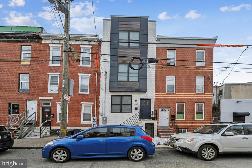 This almost new 5-bedroom, 3-full-bathroom home, just 2 years old, is an exceptional find with a remaining tax abatement. The home boasts a spacious, south-facing layout that spans over 16 feet in width, providing ample room and natural light throughout. Upon entry, the open-concept design of the living, dining, and kitchen areas creates a perfect setting for entertaining and relaxing.
On the second floor, you'll find two generously sized bedrooms, one with its own private balcony, as well as a laundry room and a full bathroom. The third floor features an expansive master suite, offering a luxurious soaking tub, a double vanity, and an oversized shower. Additionally, there is an extra room that could serve as a guest bedroom, office, or nursery.The home offers not one, but three distinct outdoor spaces, including a large roof deck perfect for gatherings. The fully finished basement adds even more value with an additional bedroom, living area, full bathroom, and plenty of closet space for storage. With an estimated 3,000 square feet of living space, this home offers a wealth of features and flexibility, all while benefiting from the remaining tax abatement. Conveniently located close to public transportation, 
shopping centers, quick ride to center city and easy access to highways and bridges. 
This home is not only spacious but also highly convenient, with an impressive Walk Score® of 89 (Very Walkable), a Transit Score® of 64 (Good Transit), and a Bike Score® of 87 (Very Bikeable), making it an ideal location for city living. See Attached flyer , lender offering a mortgage buydown for the 1st year, see details