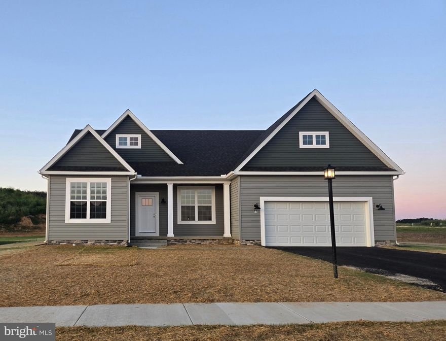 Look no further than the Autumn  for the convenience of first floor living! The Autumn is a beautiful rancher with cozy front porch to welcome you home. Just off the foyer is an office, making working from home convenient. The dining room opens to the kitchen with tons of cabinets, pantry, and a big eat at island. The family room off the kitchen has a trey ceiling and can fits lots of furniture. The split bedroom design offers lots of privacy. The primary suite boost large walk-in closet and beautiful ensuite bathroom with huge tiled shower. On the other side of the home are 2 additional bedrooms . And don't forget the huge unfished basement perfect for storage or to be finished for additional space.
Various additional plans available  including ranchers, traditional 2-stories, and first floor primary suites with 2nd story bedrooms… more !