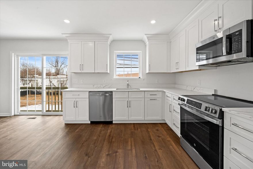 Construction is completed!   Come revisit this exciting new construction by Bromwell Homes!  This handsome two-story Colonial with front-entry garage is ideally located in New Castle, offering convenient access to Wilmington’s Riverfront, I-95, I-495, and more.  Ask listing broker about other similar homes coming available just North of Wilmington in the 2nd and 3rd Quarter of 2026!
The open-concept floor plan features a stylish kitchen with 36" cabinetry, quartz counters, stainless steel appliances, generous counter space that flows seamlessly to the informal dining area and spacious great room.  A convenient first-floor laundry and powder room, along with luxury vinyl plank flooring throughout, make everyday living effortless.
Upstairs offers three bedrooms and two full baths. The large owner’s suite includes a full bath with double vanity, oversized shower, and two walk-in closets. The hall bath serves two well-scaled bedrooms, each with excellent closet space and natural light.
Additional highlights include clean electric HeatPump, Central AC, 200-amp electrical service, maintenance-free exterior, premium insulation package, and the peace of mind that comes with a 10-year new home warranty.  Final grading is not completed as depicted in edited photo.