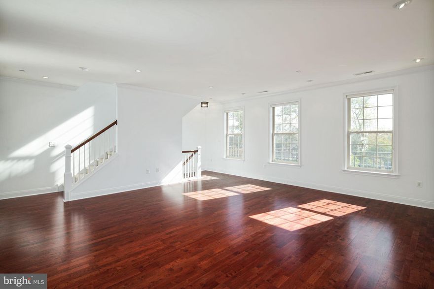 On the resale market for the first time!  This meticulously maintained, upgraded top floor "Drake" model town home with 3 bedrooms and 2.5 bathrooms, features a private garage and balcony spanning the entire width of the home!  Located in the highly desirable gated Naval Square community, this top floor unit has an open floor plan with several exposures, lots of windows, and receives abundant natural sunlight.  As one enters the spacious living/dining level, they are greeted by Brazilian Cherry wood floors that run the periphery of this floor.  Recessed lights have been installed throughout, and highlight the different living and dining areas.  The Chef's kitchen has tall wood cabinets, granite counter tops and stainless steel appliances.  The kitchen is set up with an elevated granite counter slab that behaves like a breakfast bar, and is ideal for entertaining.  The large, private balcony is located off the kitchen and formal dining area; it's sprawling, so it actually bares two separate entrances - one off of the kitchen, and one off of the dining area.  This unit has a massive footprint, that is further exaggerated by its tall 9 foot ceilings.  There is also a powder room on this level.
As one heads upstairs, they are greeted by 3 abundantly sized bedrooms, 2 bathrooms, and a full size washer/dryer closet.  The master bedroom features a vaulted ceiling adorned with ceiling fan, and an en-suite 4 piece bathroom.  There is also an immense walk-in closet in the master bedroom.  Both the secondary bedrooms feature ceiling fans and vast closet space, whereas they share a 3 piece bathroom.  The entirety of 303 Surgeon General's Court has been freshly painted, and is turn key!  The private garage has had shelving installed for additional storage space.
Spanning over 20 acres, residents of Naval Square (a National historic landmark) enjoy the "suburban feel" the neighborhood has, while still being in arguably the most desirable part of the city.  Amenities include 24-hour manned guard house, gated community, fitness center, seasonal outdoor pool, sundeck, lushly planted walking trails, guest parking and concierge services.  Situated in Graduate Hospital, one can walk to CHOP, Penn, Drexel, Schuylkill River park, Fitler Square, Rittenhouse Square etc.