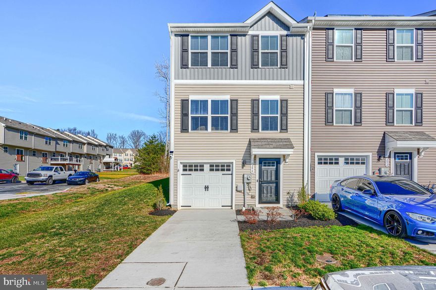 Welcome to 290 Tournament Cir in North East, MD — a modern, move-in-ready gem in the highly sought-after Chesapeake Club community.
Built in 2022, this end-unit townhome offers peace of mind with everything only 3 years old, plus a brand-new deck added just 6 months ago. The home is in perfect condition from top to bottom and still includes the builder’s warranty for added protection.

This property features 3 levels of thoughtfully designed living space, including 3 bedrooms, 2.5 baths, a lower-level office/flex room, and an attached garage.

The middle level is the heart of the home, showcasing a gorgeous open-concept design. The spacious eat-in kitchen includes a massive island—ideal for baking Christmas cookies, hosting holiday spreads, or simply enjoying that much-needed extra counter space. The kitchen flows seamlessly into the oversized living room, creating the perfect space for entertaining, relaxing, or gathering with friends and family.

Upstairs, you’ll find three well-appointed bedrooms, including a comfortable primary suite designed for everyday comfort.

Outside the home, the location is a major bonus. You’re just minutes from North East Main Street, packed with local charm, incredible restaurants, cozy cafes, small shops, and everything that makes this waterfront town special.

If you're looking for a pristine, turn-key home in a premium location with unbeatable convenience—this one checks every box.