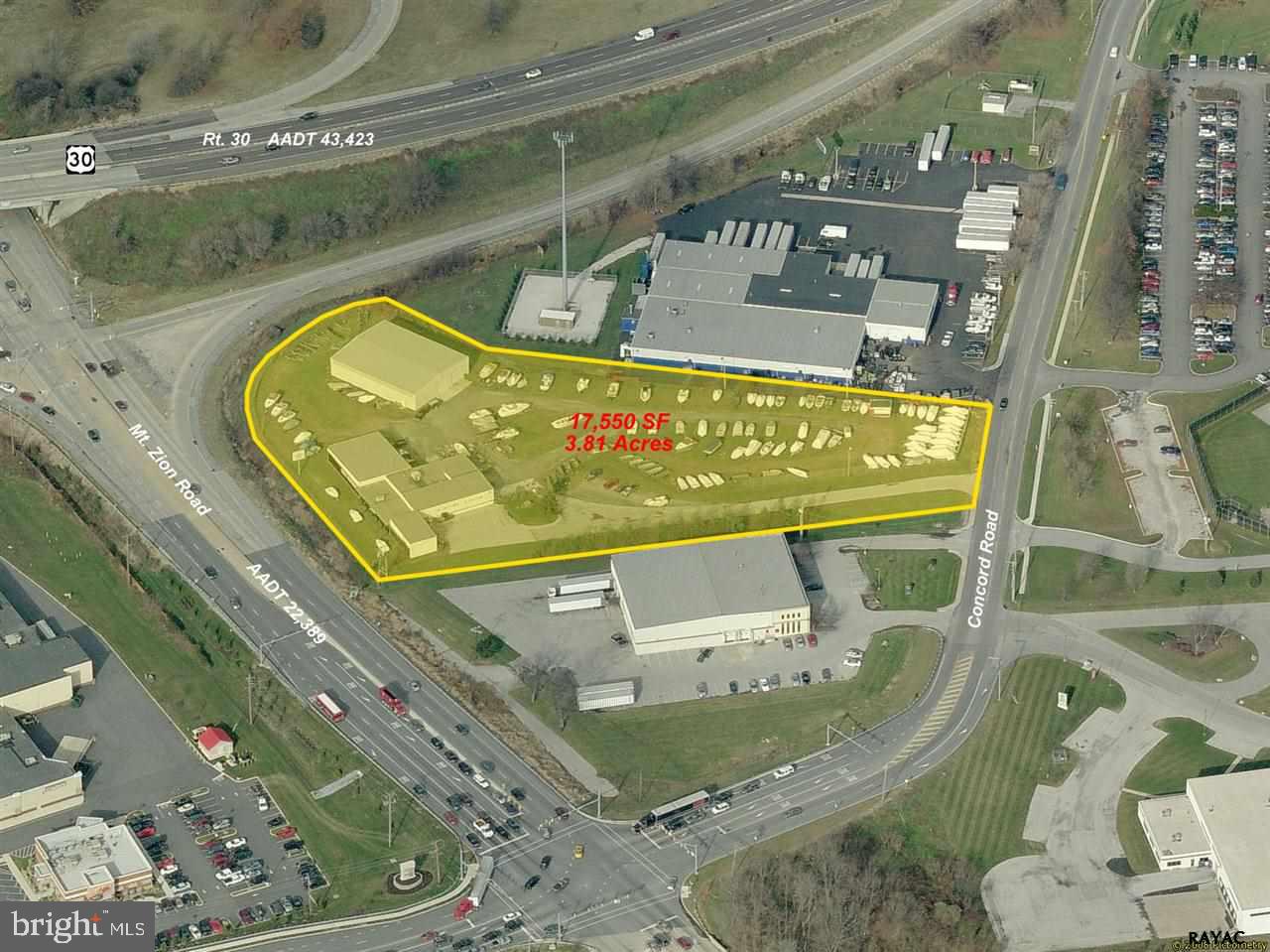Prominent and highly visible location at the interchange of US Route 30 and PA State Route 24. Great traffic counts. Property currently consists of two buildings: a 10,275 SF showroom with a small shop and three OHDs (12'x12' / 12 x10 / 12'x10') plus a 7,275 SF free span metal warehouse with 20' ceiling at peak and two 16'x14' OHDs.