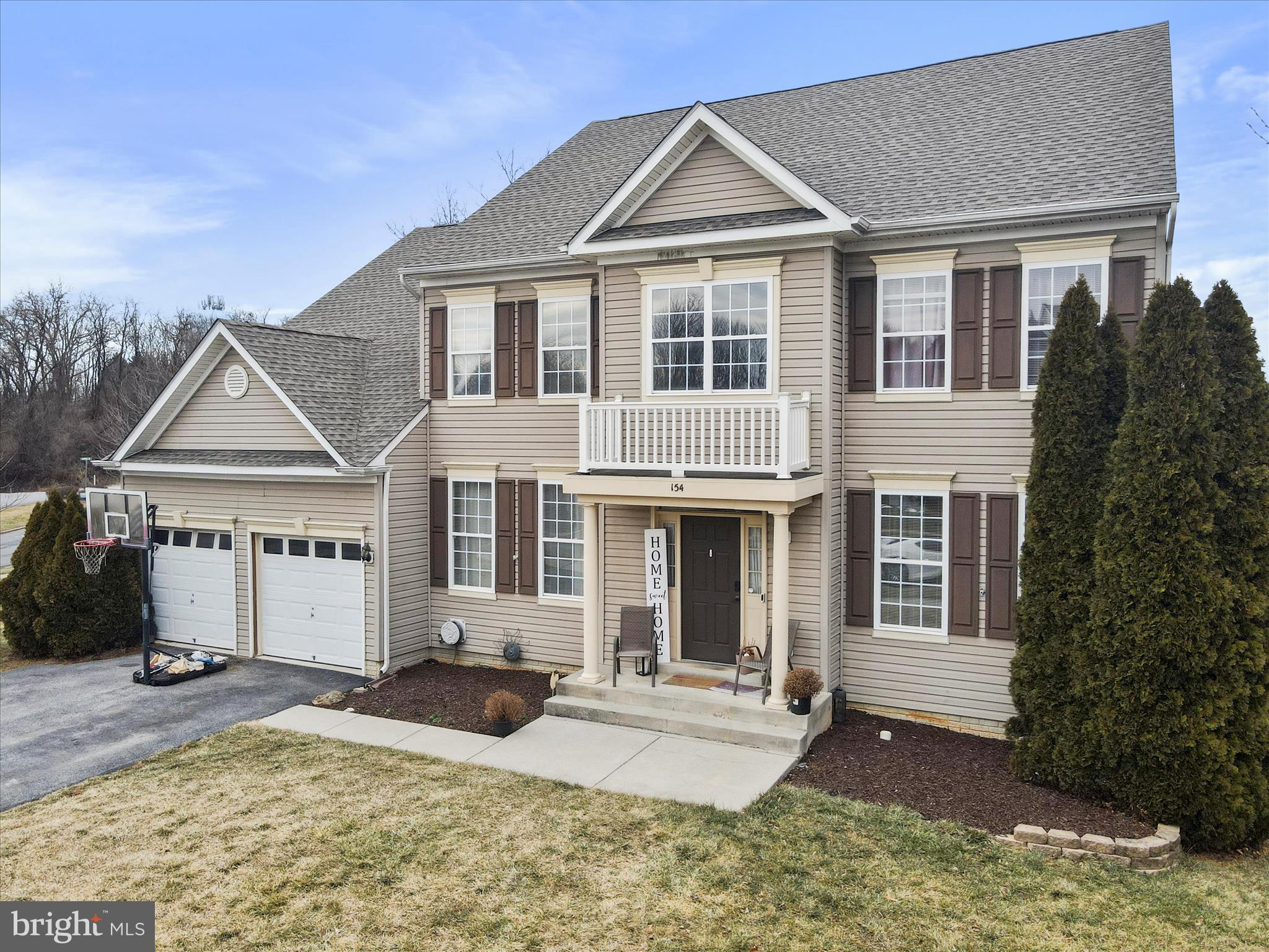 Welcome to Norborne Glebe Community! This 4 bed, 4.5 bath colonial has all the features you are looking for! Upon entering the front door you are greeted with a complete open floor to ceiling entryway with separate formal living and dinning rooms with decorative trim work. The large open kitchen includes an island/breakfast bar, corian countertops, butler's pantry, gas range, and breakfast/morning room. Just off the kitchen is an open and spacious family room with cozy gas fireplace and 2 story windows. Directly off the family room is an office, half bath and a hallway leading to the formal living room and formal dining room. There are two staircases leading to the second floor, conveniently located in open foyer and off kitchen for easy access. Upstairs offers a massive master suite that includes a sitting area, huge walk-in closet, double vanities, shower, and soaking tub. There is a princess suite offering another full bath. 2 additional bedrooms to complete the second floor. The basement is fully finished walk-out basement that offers an open family room/recreational room, and additional two rooms that are currently being used as a bedrooms. New roof in 2018, new HVAC and heat pumps in 2017.
Great exterior features include a large front porch, and low maintenance composite rear deck overlooking the backyard with a heated in-ground gunite pool (32'9 x 16')with extensive landscaping for your own backyard oasis. Close to all the amenities of town and just off US-340 and WV-9 for easy commuter access. Schedule your appointment to see while this one lasts.