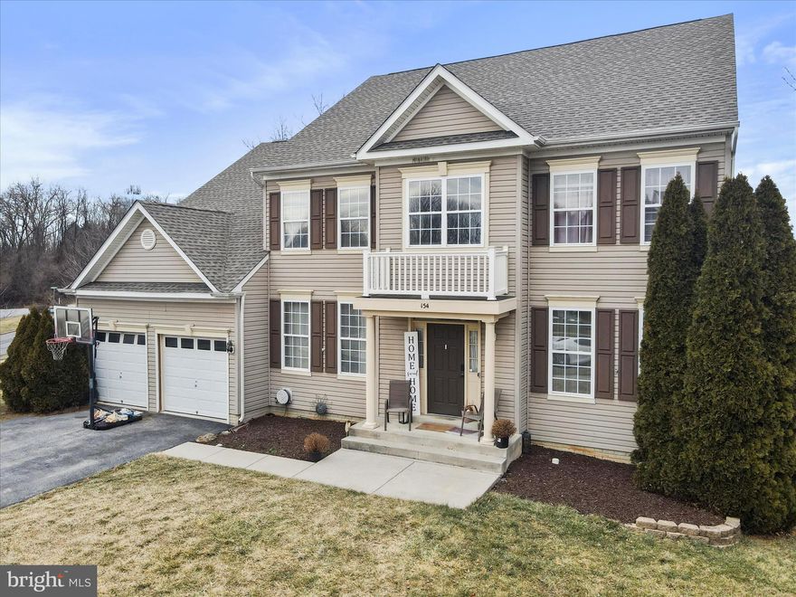 Welcome to Norborne Glebe Community! This 4 bed,  4.5 bath  colonial has all the features you are looking for! Upon entering the front door you are greeted with a complete open floor to ceiling entryway with separate formal living and dinning rooms with decorative trim work. The large open kitchen includes an island/breakfast bar, corian countertops, butler's pantry, gas range, and breakfast/morning room. Just off the kitchen is an open and spacious family room with cozy gas fireplace and 2 story windows. Directly off the family room is an office, half bath and a hallway leading to the formal living room and formal dining room. There are two staircases leading to the second floor, conveniently located in open foyer and off kitchen for easy access. Upstairs offers a massive master suite that includes a sitting area, huge walk-in closet, double vanities, shower, and soaking tub. There is a princess suite offering another full bath. 2 additional bedrooms to complete the second floor. The basement is fully finished walk-out basement that offers an open family room/recreational room, and additional two rooms that are currently being used as a bedrooms.  New roof in 2018, new HVAC and heat pumps in 2017. 
Great exterior features include a large front porch, and low maintenance composite rear deck overlooking the backyard with a heated in-ground gunite pool (32'9 x 16')with extensive  landscaping for your own backyard oasis. Close to all the amenities of town and just off US-340 and WV-9 for easy commuter access. Schedule your appointment to see while this one lasts.