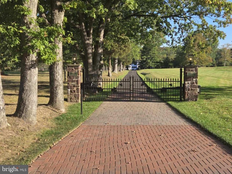 Spring Lane Farm, a magnificent 47 acre Bucks County Farmhouse  Estate, is ready for it's next amazing chapter. Rarely does a property of this magnitude became available in such a highly sought after location. This splendid offering, with a home that a portion of which dates back to 1750 and one of the most spectacular ponds you will find anywhere, is now available to purchase.  Thoughtfully updated many times along the way, a gated entry and long driveway reveal a tranquil natural setting. Featuring  3/4 bedrooms, original pumpkin pine floors, the home is a picture perfect rendition of a colonial era farmhouse modernized for today's living. Neutrally appointed, quite spacious throughout, and full of natural light with long distance views from many vantage points, the home is in mint, turn key move-in condition, and it will feel like "home" from moment you enter. The gourmet kitchen features high end appliances, marble counters, island seating for four and adjoins the family room and three seasons sunroom, making this space ideal for entertaining. The office/library has built-ins and a wall of windows with long distance views. The formal dining room can accommodate a large gathering, and the original "keeping room" is flexible space for use as a formal living room or breakfast room. A laundry room and powder room complete the main floor. The upper floor reveals the beautiful Primary Suite and huge Primary bath, bright and airy bedrooms 2 and 3, spacious hall bath, a bonus room that could be for entertainment, quiet study, or use as bedroom 4, and large walk-in hall cedar closet. There is also basement access from inside the house and outside as well.  Once outside, the timeless Bank Barn has multiple levels and is in immaculate condition as well, a two car garage and additional carport will house up to 10 cars under cover. A well appointed small animal barn with stalls, multiple pastures, idyllic pond and pump house, and ample open space and woodlands make this an outdoorsman's paradise.  This most distinguished offering consists of three contiguous parcels totaling 46+- acres.  Although the properties are in conservation and cannot be sub-divided, a generously sized building envelope will accommodate a permitted additional home and ancillary uses, and additional structures. Coupled with the connection to natural gas ( w/ whole house backup generator ), the home is connected to public water and public sewer, a rarity for a property of this age and magnitude.  All of this plus super low taxes equals a once in a lifetime opportunity to acquire a legacy Bucks County Farmhouse property located in the Heart of the Council Rock School District, just minutes to Newtown Boro.