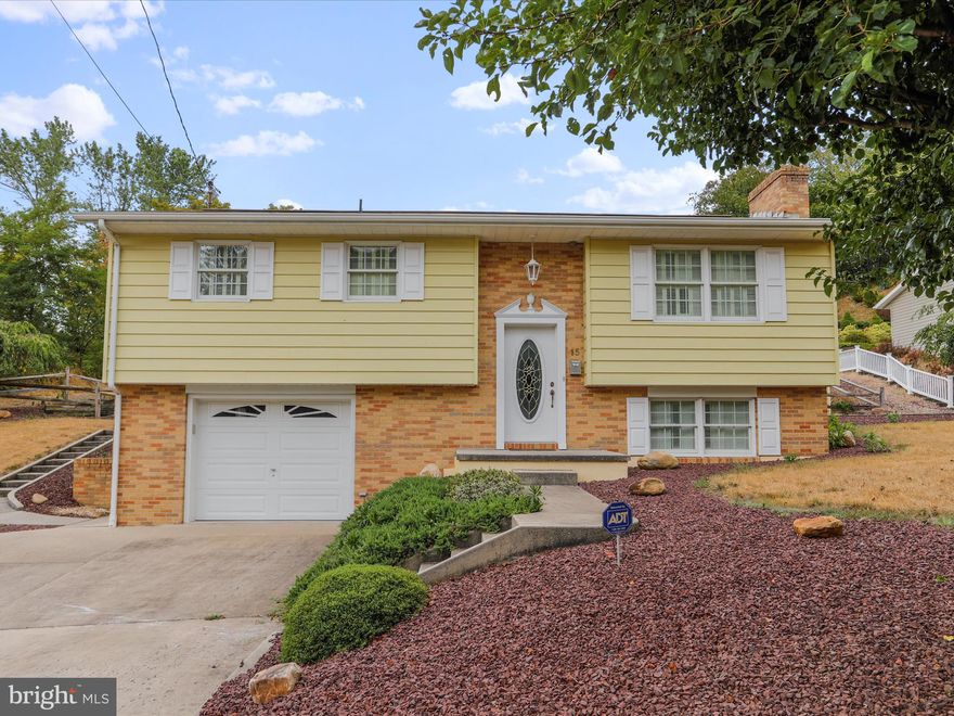 HURRY! This meticulously maintained 3 Bedroom, 2 Bath split foyer is move in ready! Highlights include a FABULOUS screened porch, a luxuriously updated main floor bath with a jetted tub, gleaming hardwood floors, tile floor in kitchen w/ solid surface countertops and sink, a concrete driveway, a large rear patio adjacent to the screened porch for grillin' and chillin' space, and a nice family room w/ fireplace. In short, you don't see homes this clean often, so make your appointment today! You will be glad you did!