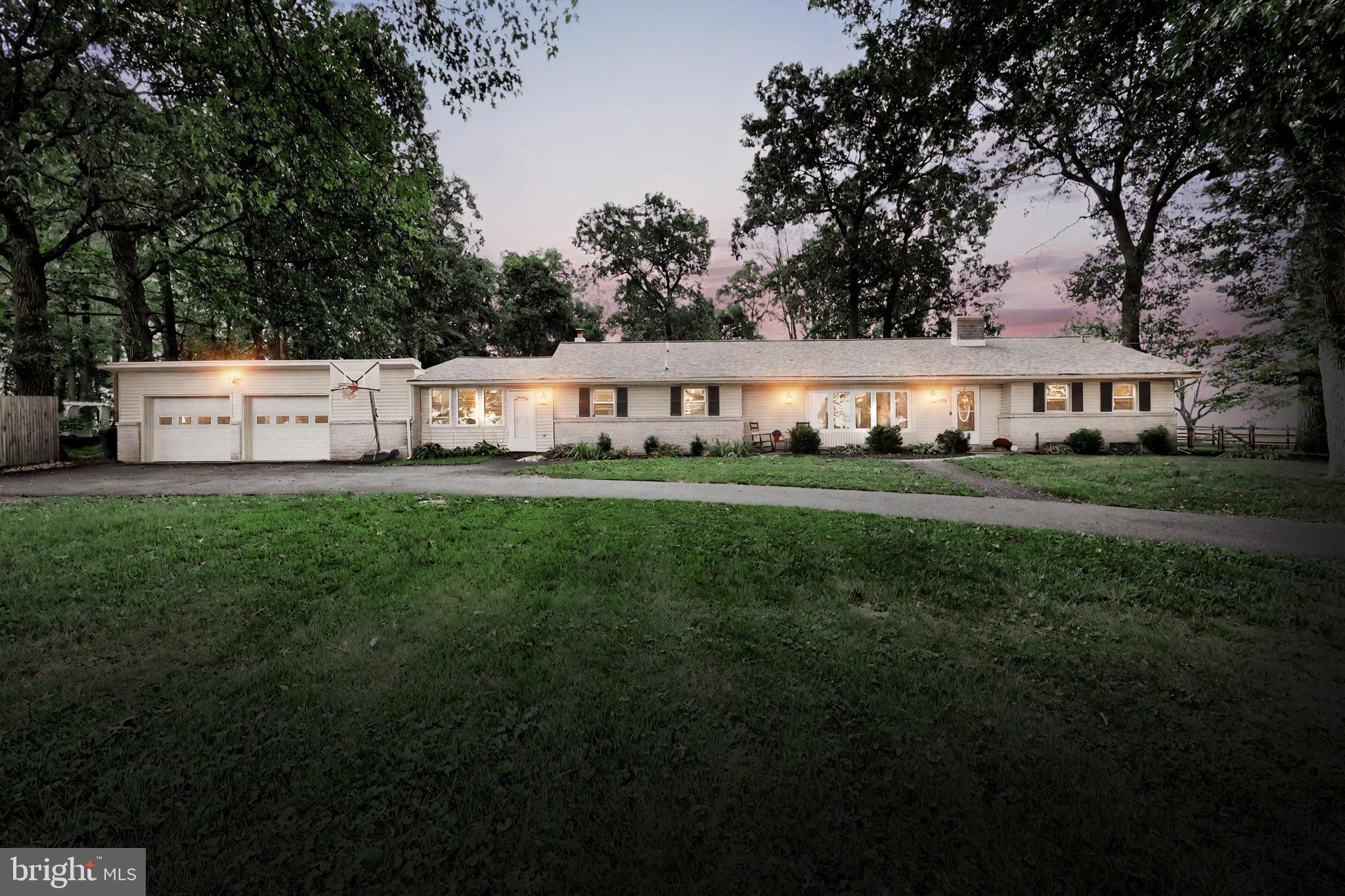 Sprawling Rancher on 2+ Acres in Brogue!
Discover the perfect blend of space, one-floor living, and country charm in this 2,237 sq. ft. ranch-style home situated on 2.195 acres tucked away off of Route 74. With 3 bedrooms and 2 full baths, this property offers an open-concept main living area featuring a living room, large updated kitchen complete with a center island, glass cooktop, and brand-new stainless steel appliances, and dining area. Just off the kitchen you'll find a spacious family room complete with a cozy woodstove, perfect for those chilly nights. Continue to the other side of the home, this area features a full bath with laundry, an in-home office space, and a versatile recreation room. This room provides endless possibilities—ideal as a playroom, media room, or even a future primary suite. Through the sliding glass door from the kitchen, step into your own private retreat. The fully fenced, level backyard is partially wooded for privacy and relaxation, while the covered patio extends your living space with room for an outdoor lounge, dining area, and fire pit. Homesteaders will love the chicken coop/storage shed and the large garden area. The basement has an unfinished 25x27 Rec room with a cozy fireplace and the start of an additional full bathroom, adding even more potential for expansion of another finished 720 sq ft. The oversized 2-car garage has plenty of room for storage and a workshop. Perfect for the car enthusiast or woodworker.
Practical updates include a newer roof (2020), an upgraded electrical panel, and 2 Hot Water Heaters one in 2025. Located just 10 minutes from Red Lion, this home offers the best of both worlds—quiet country living with quick access to town conveniences.